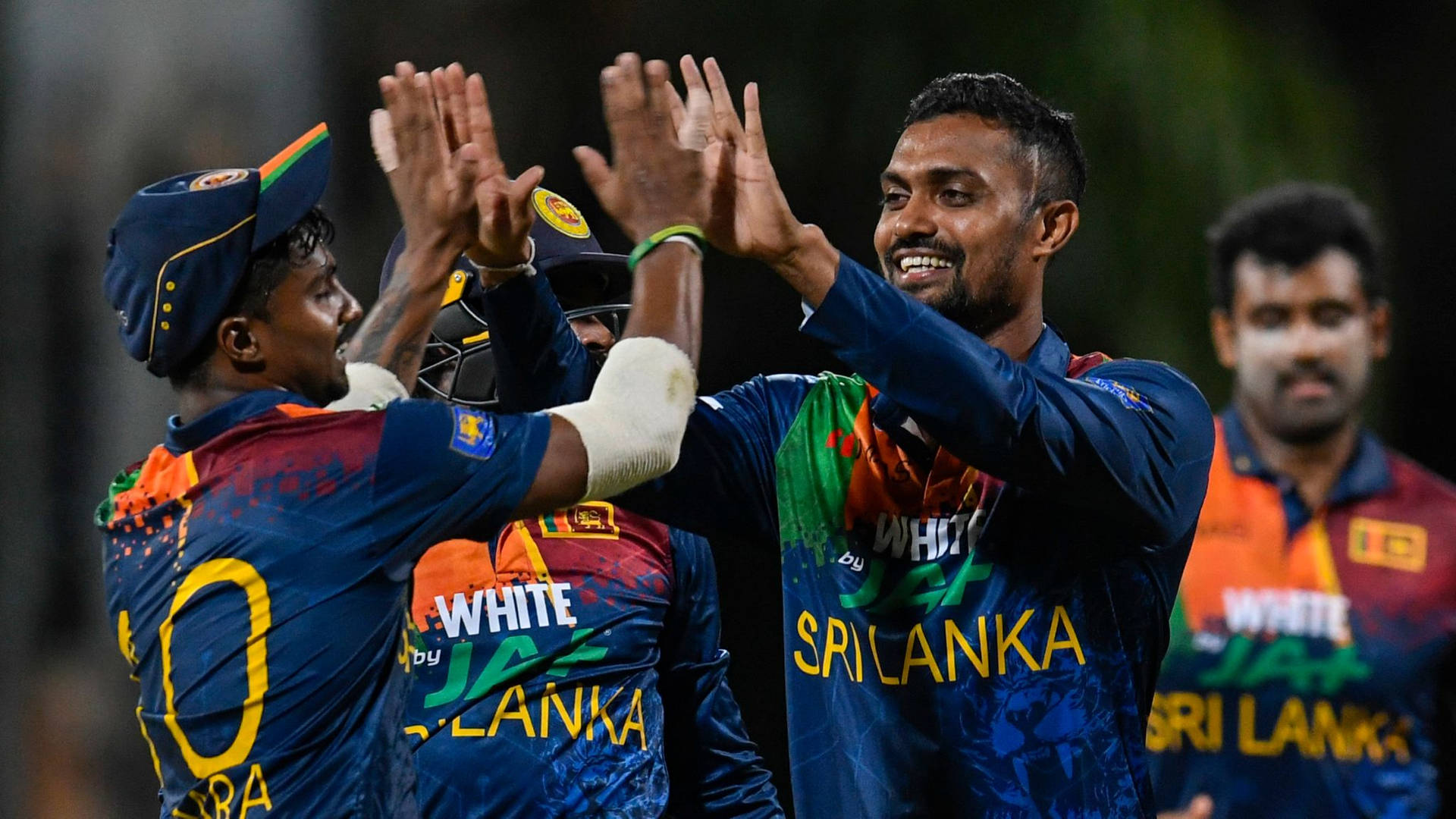 Sri Lanka Cricket Players Joyful Background