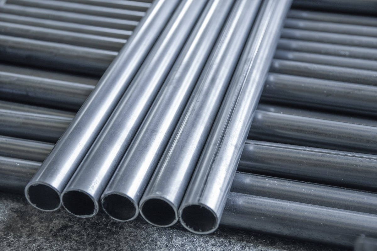 Stack Of Galvanized Iron Pipes Background