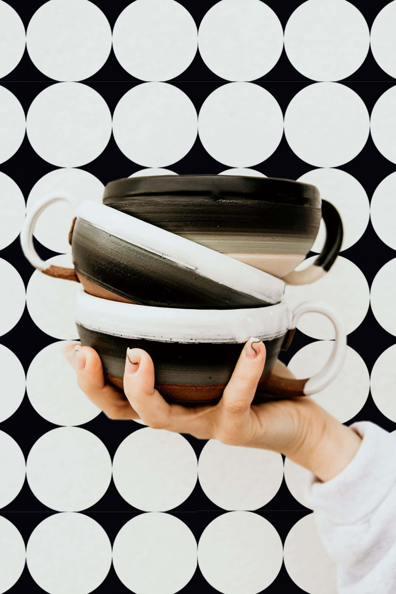 Stacked Ceramic Bowls Polka Dot Background