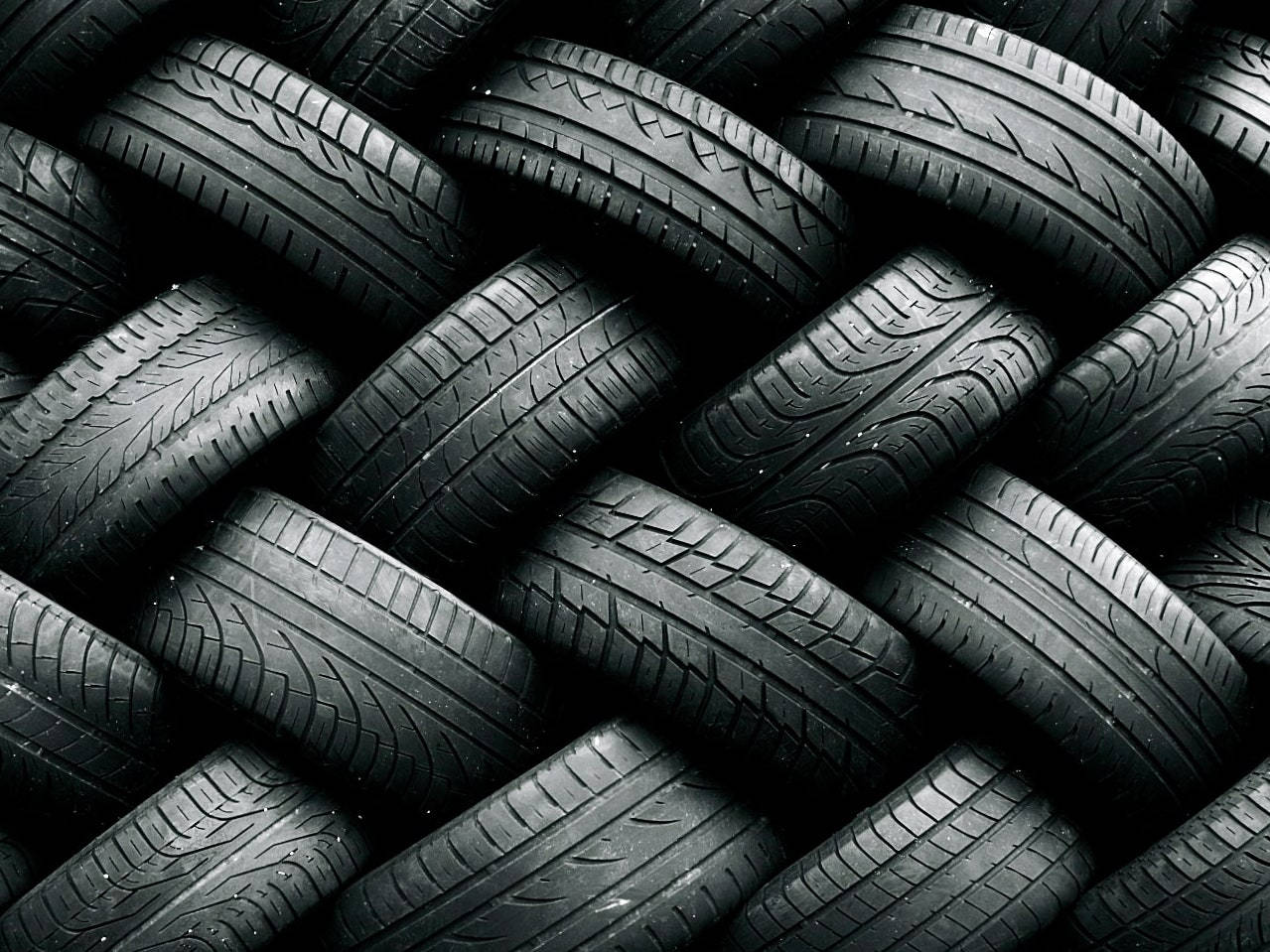 Stacked Goodyear Tires Background