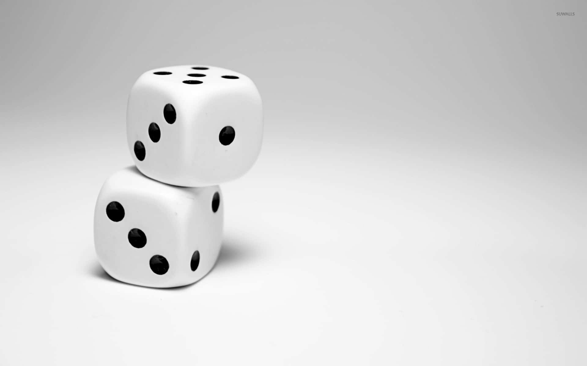 Stacked White Dice Gray Background.jpg