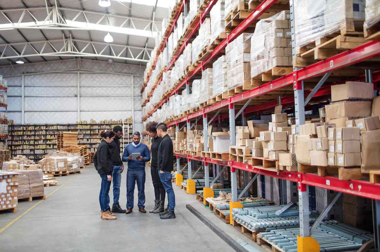 Staff Discussing Beside Wholesale Column Background