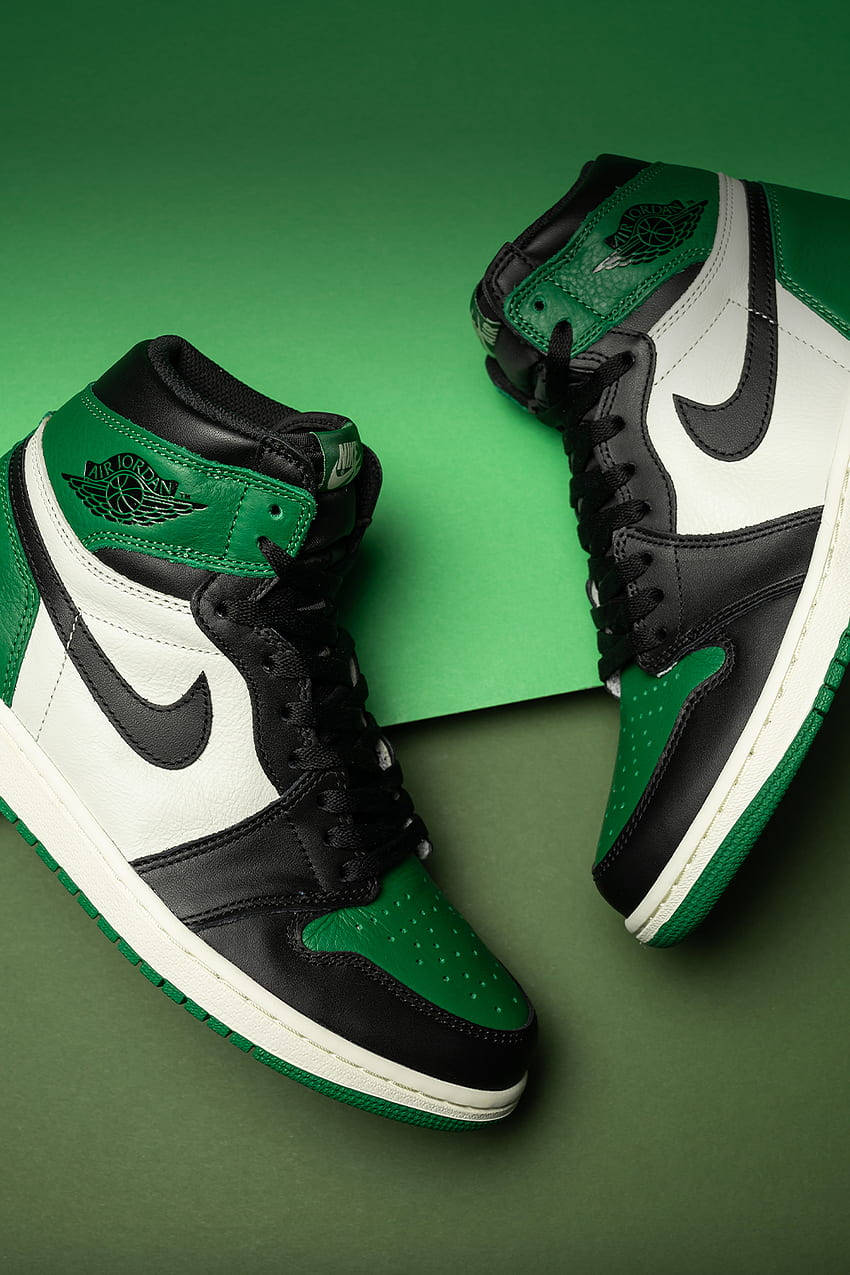 Stand Out With Nike Air Jordan 1 Green Background