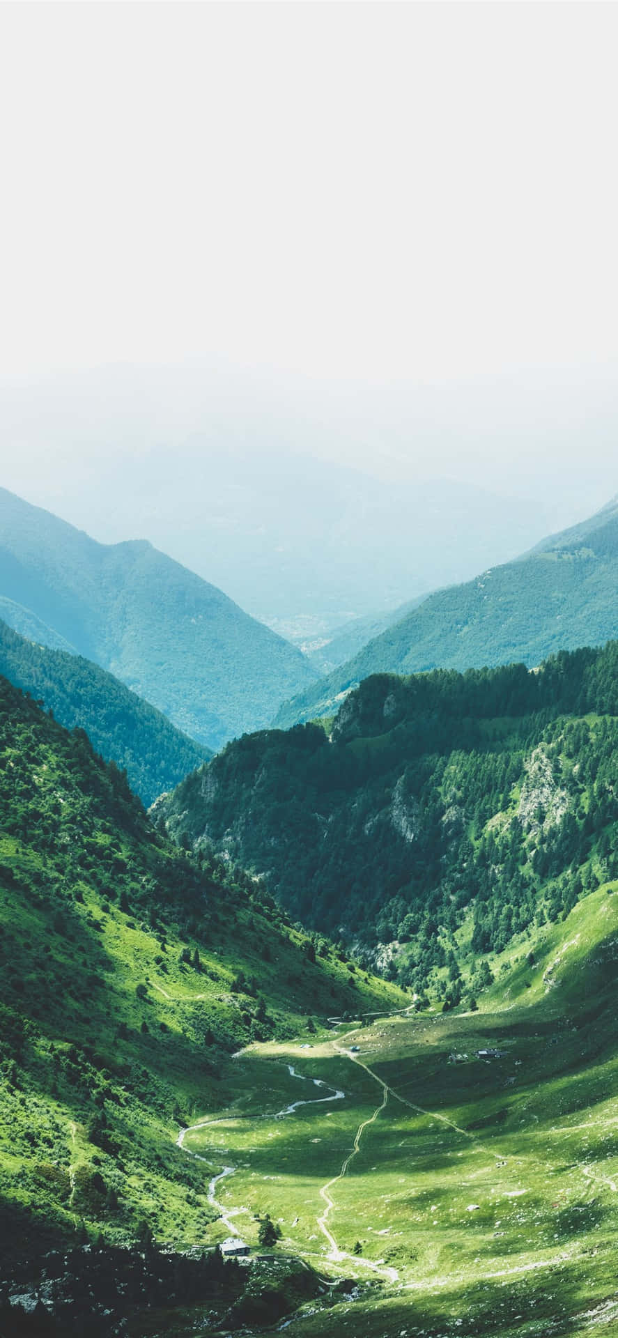 Standing On The Mountain And Looking At The Vastness Of The Horizon. Background