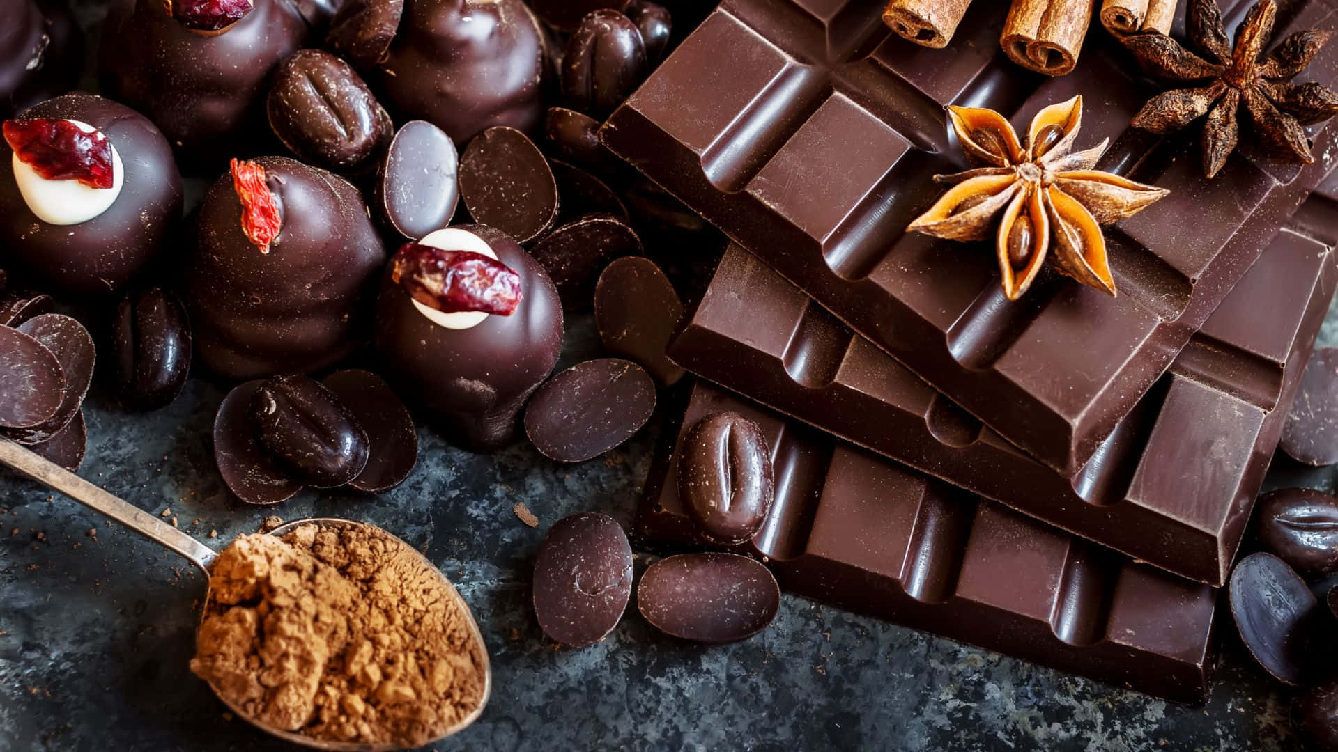 Star Anise And Cinnamon Spices On Chocolate Background