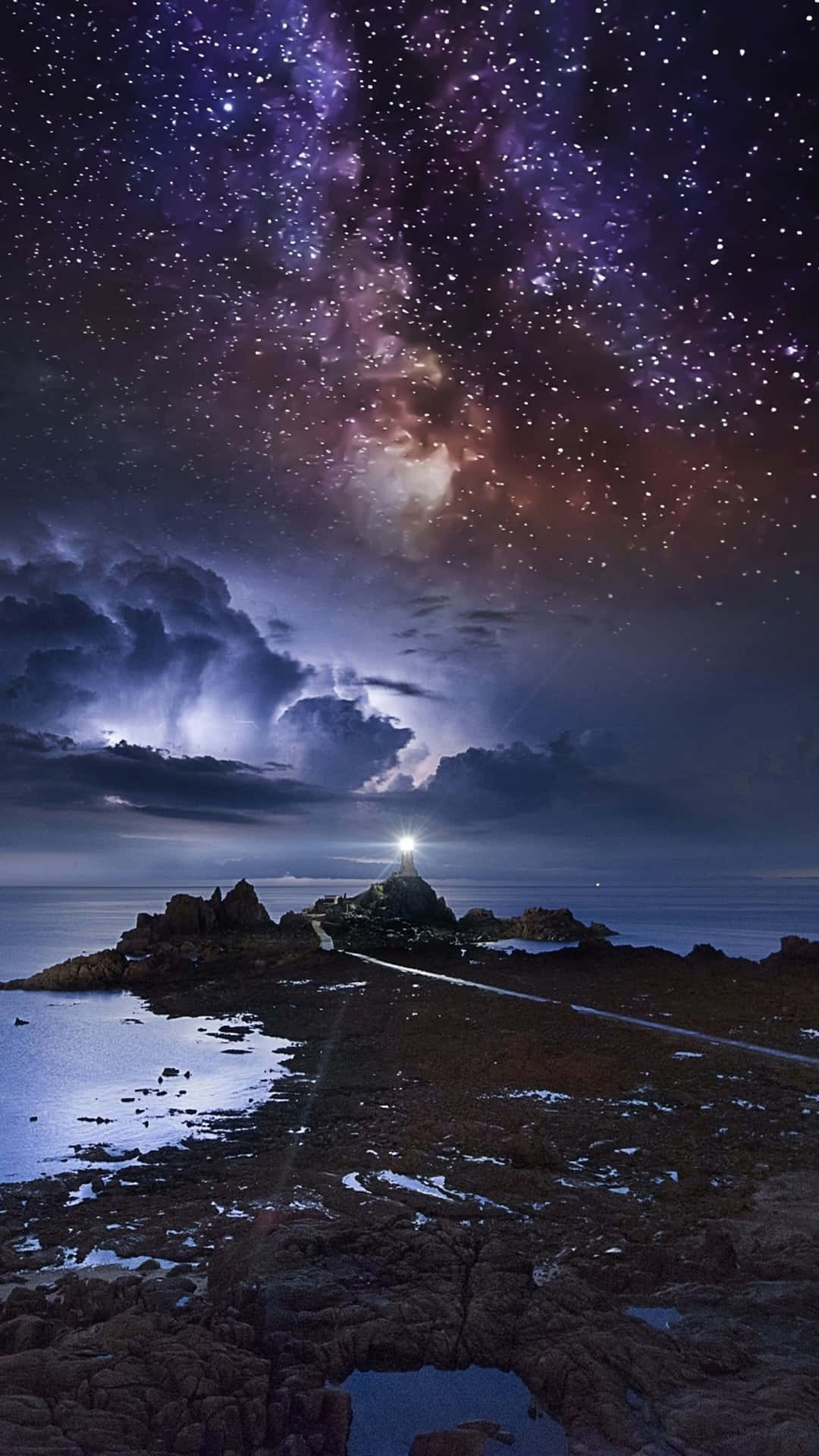 Star Sky With A Lighthouse Background