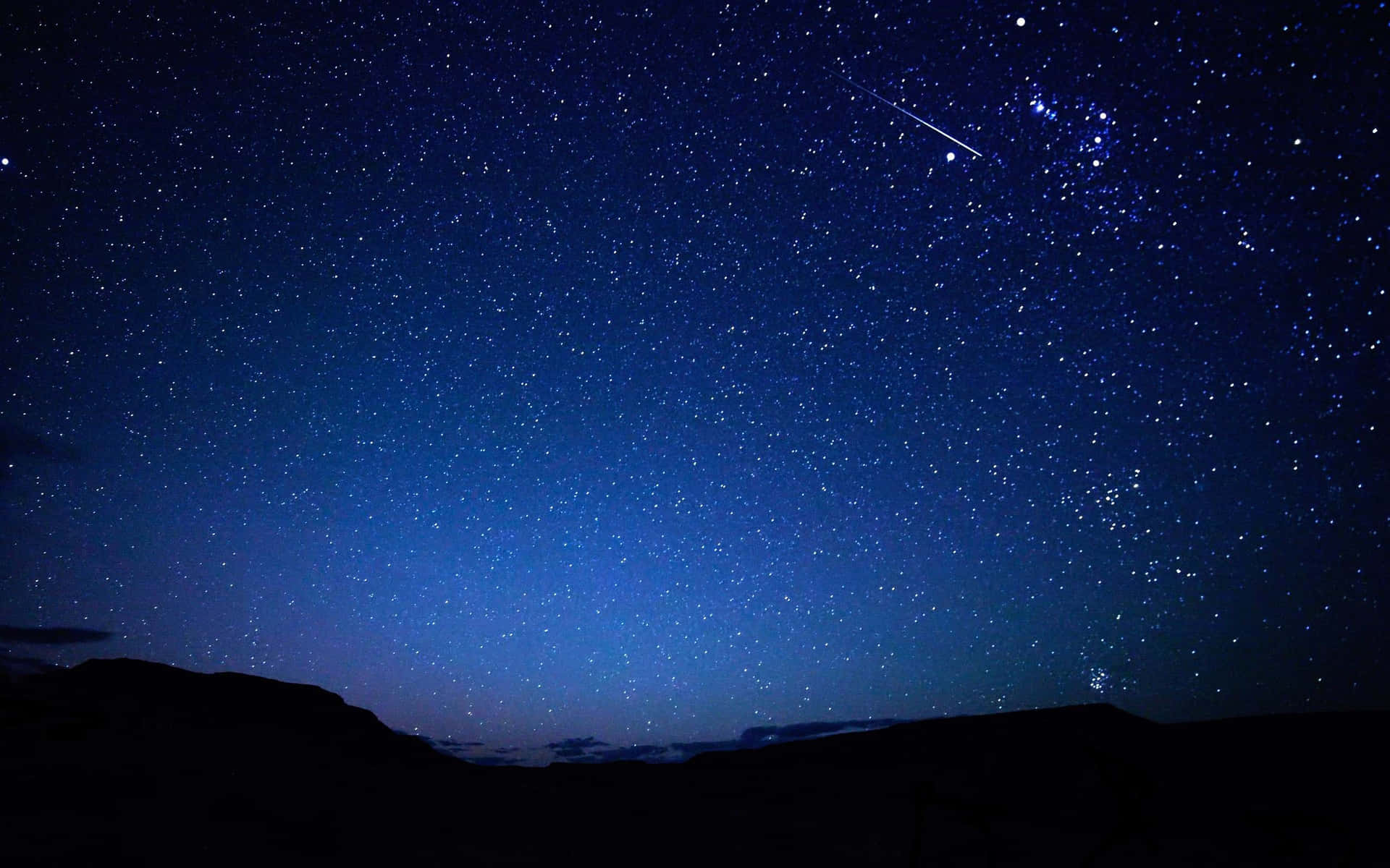 Star Sky With Hilly Terrain Background