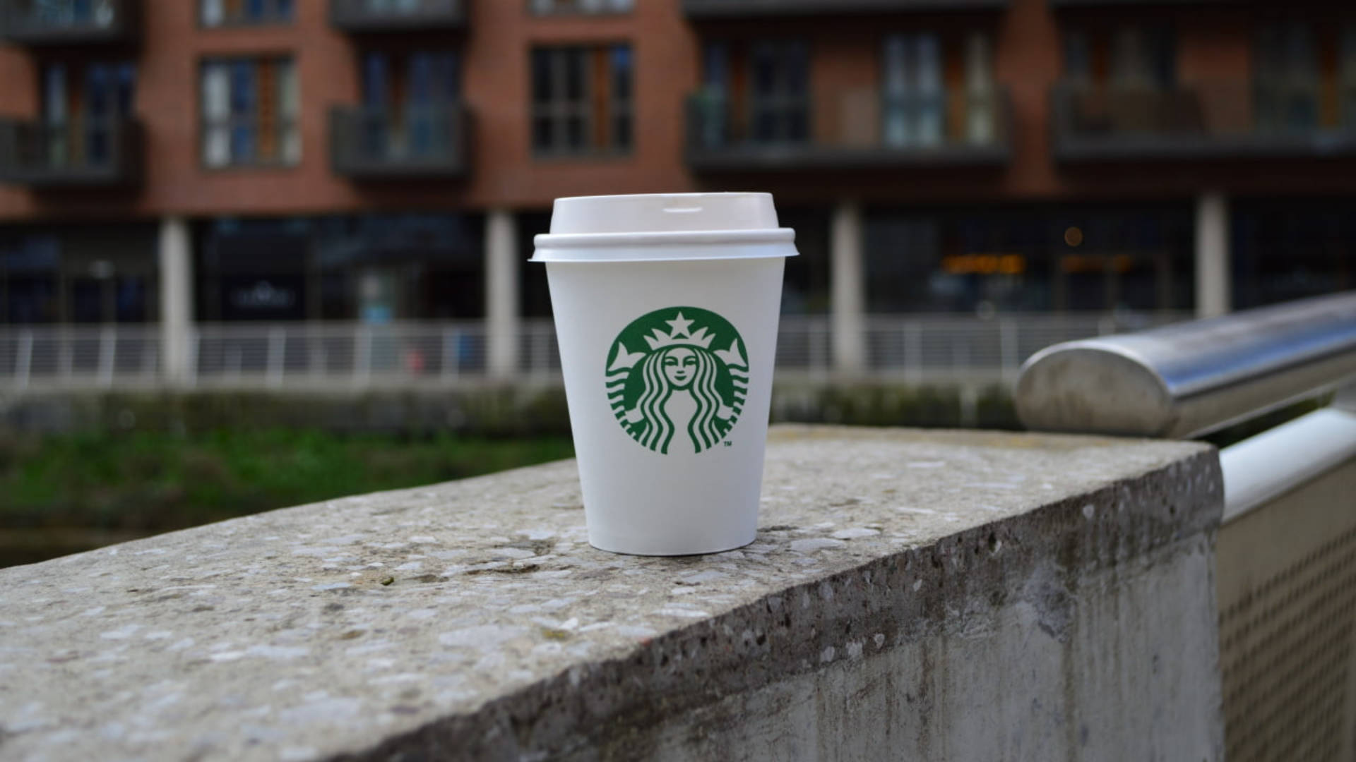 Starbucks Cup On Concrete Background