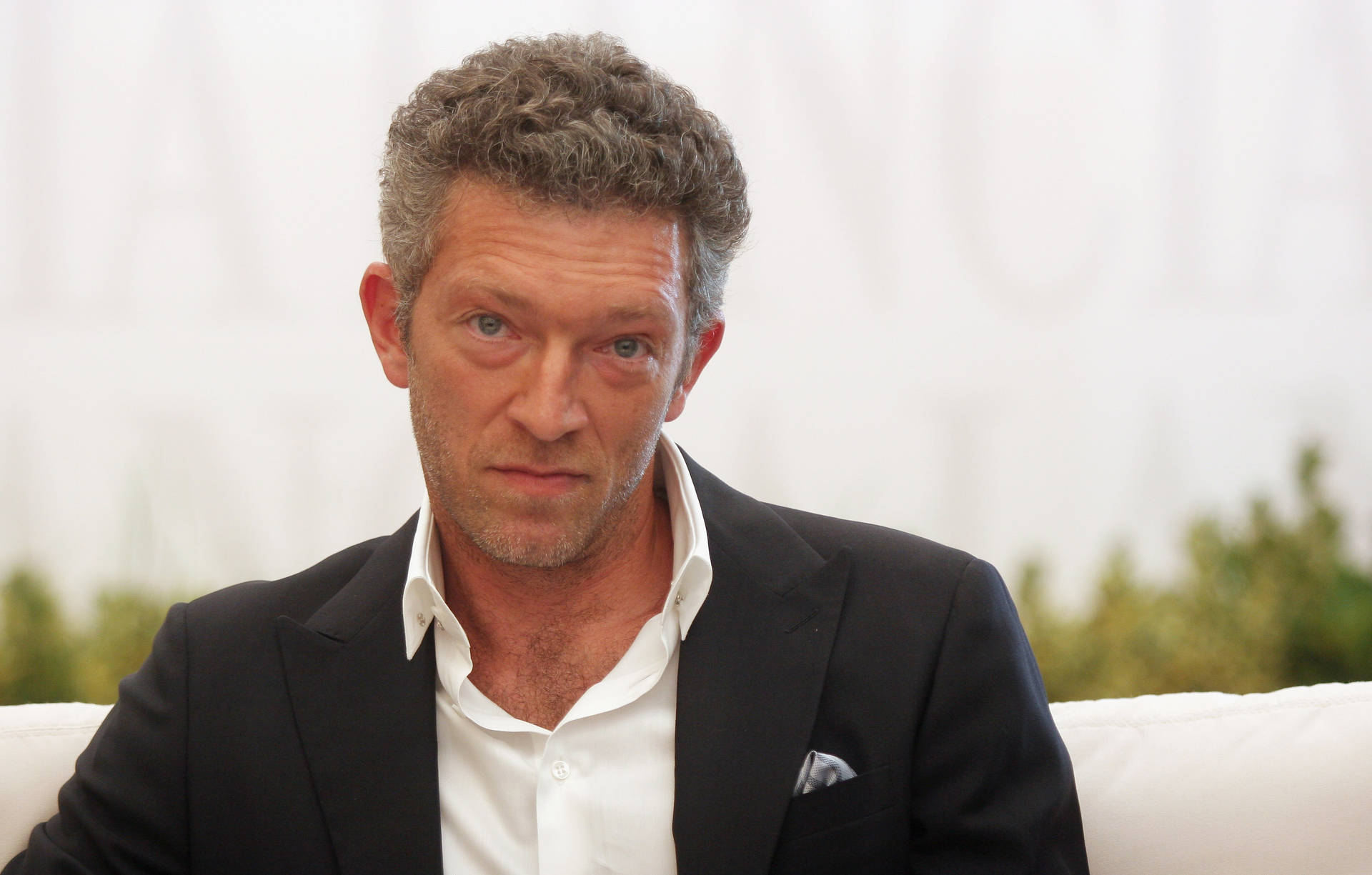 Staring Vincent Cassel Black Suit