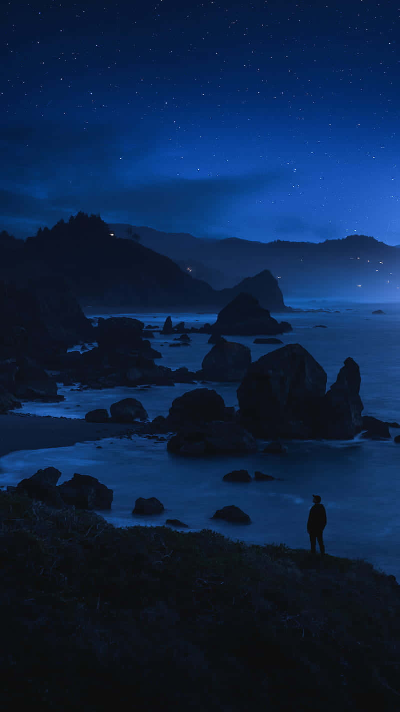 Starry Night Coastal Vista Background