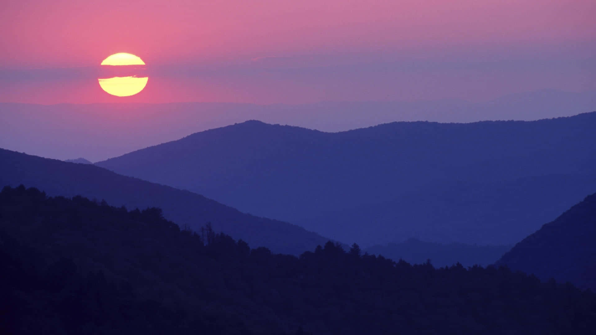 Start Fresh Everyday With A Beautiful Blue And Purple Sunset Background