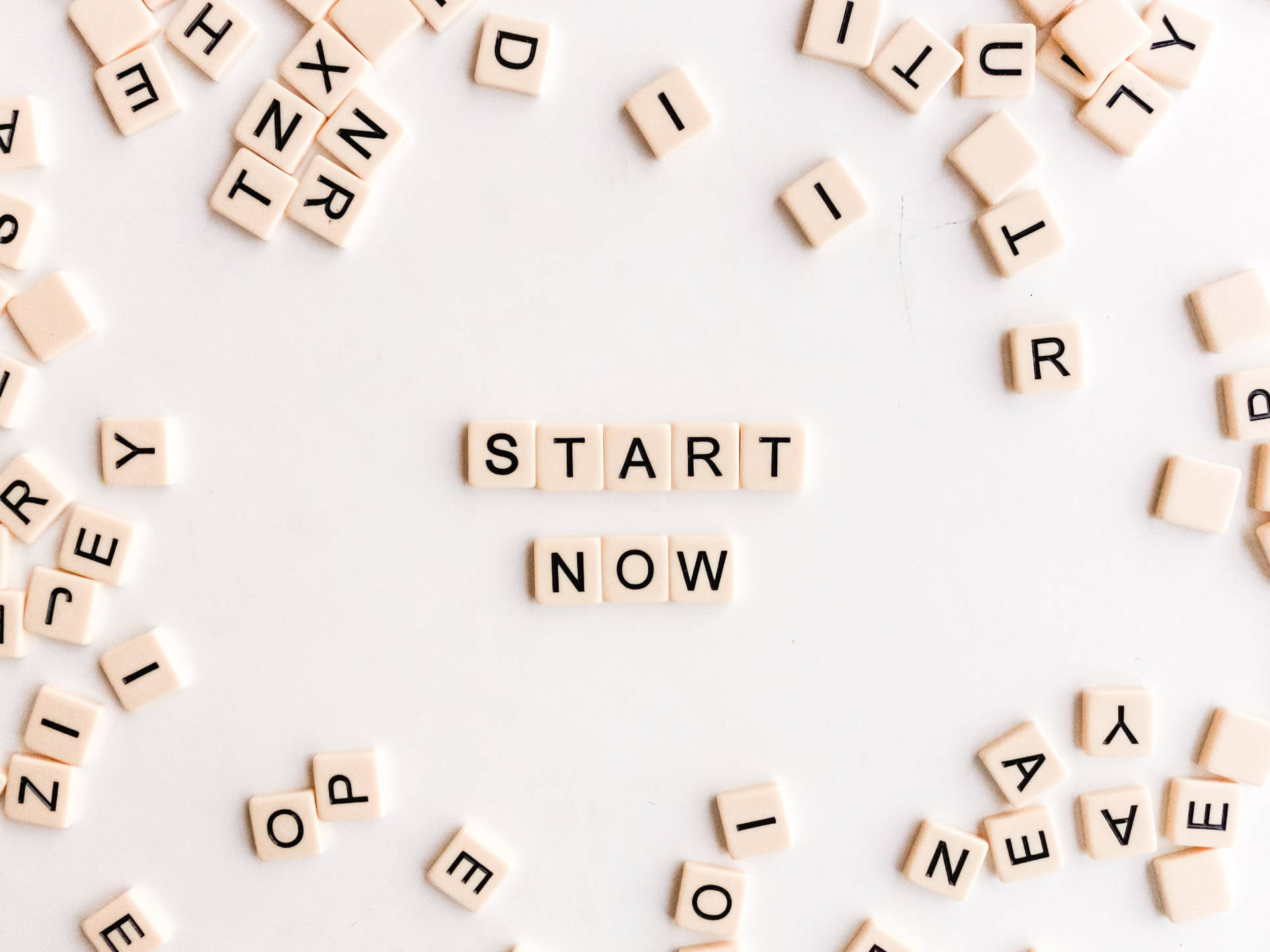Start Now Motivational Scrabble Letters Background