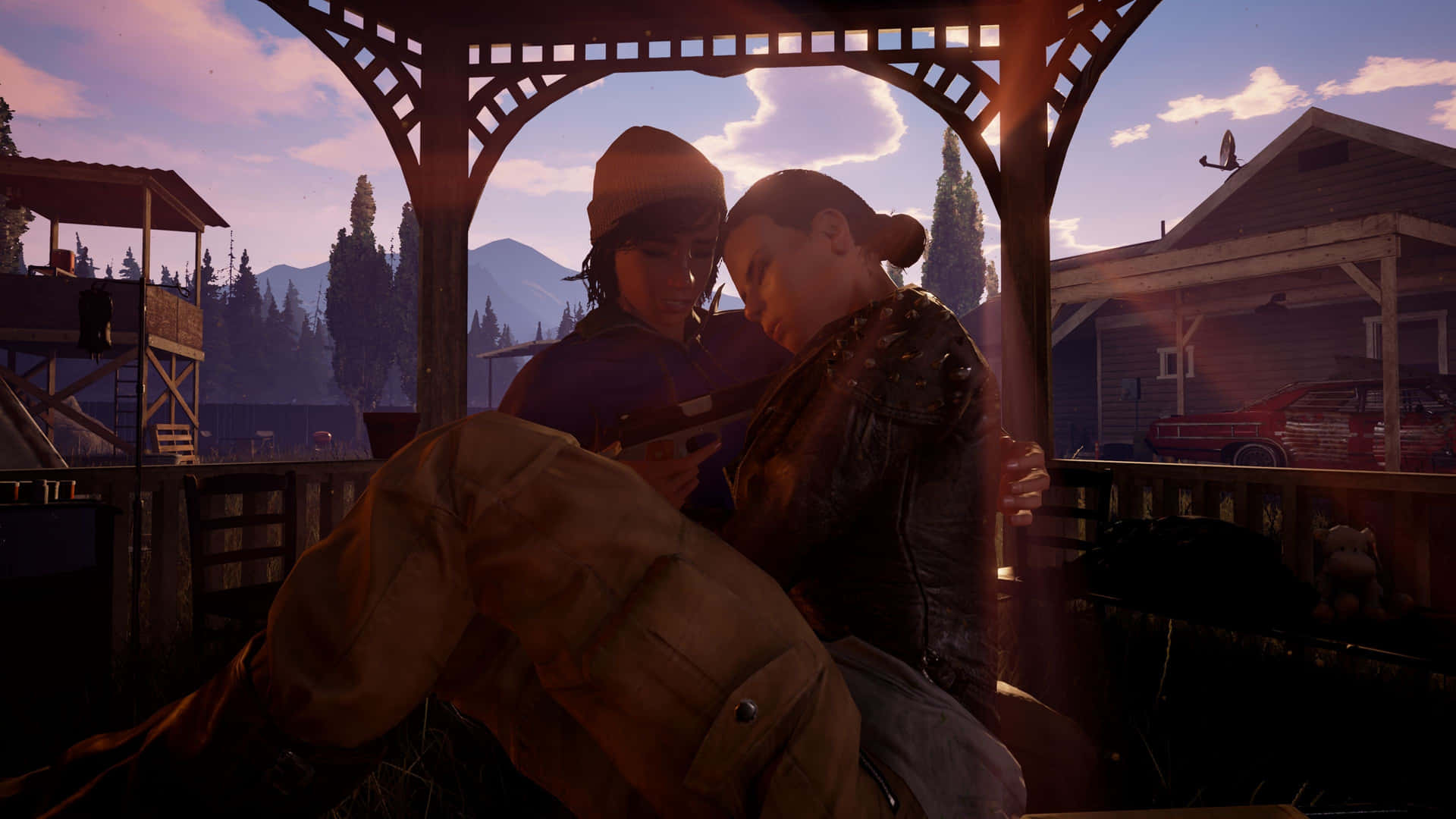 State Of Decay2_ Survivors Embrace At Sunset Background