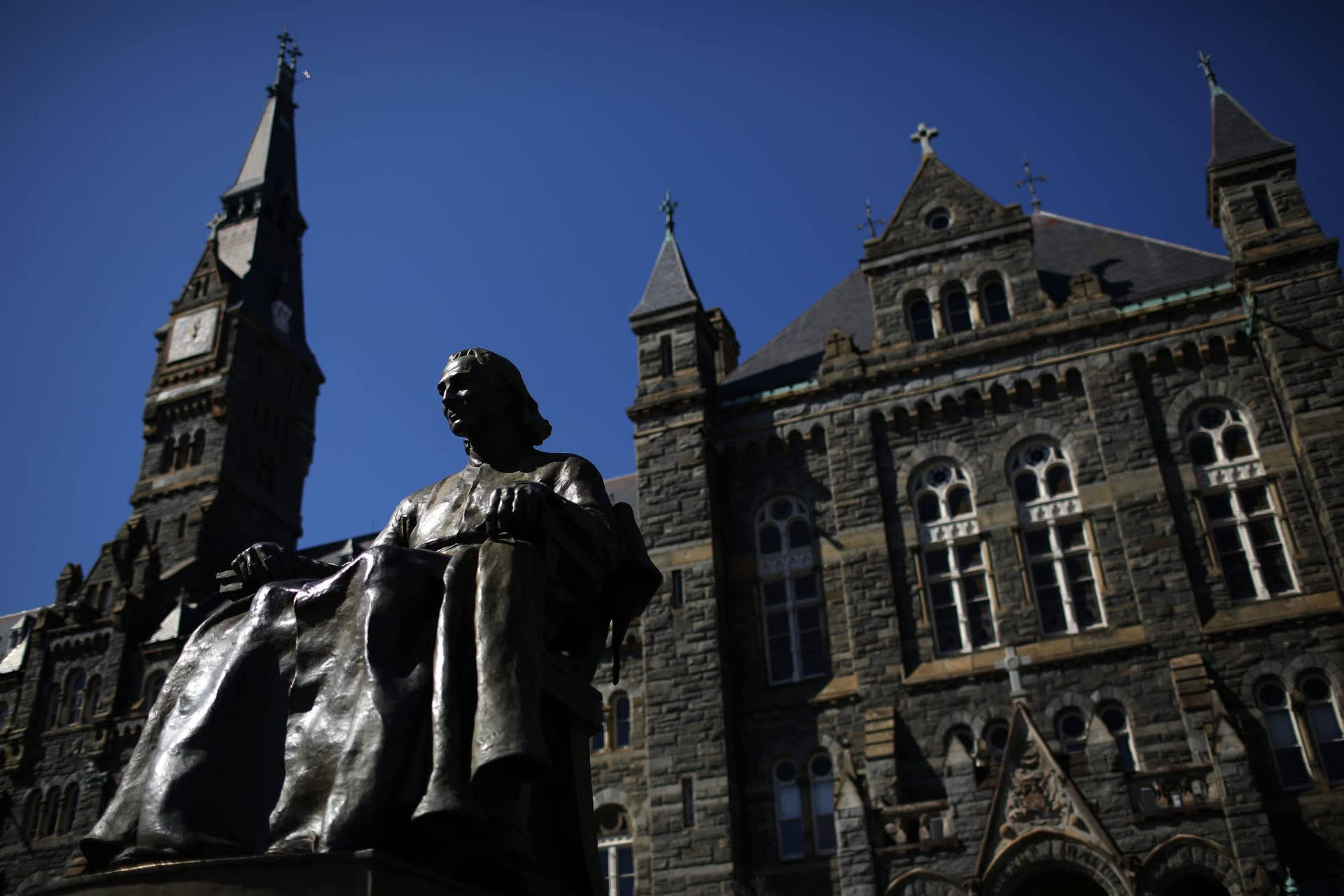 Statue At Georgetown University Background