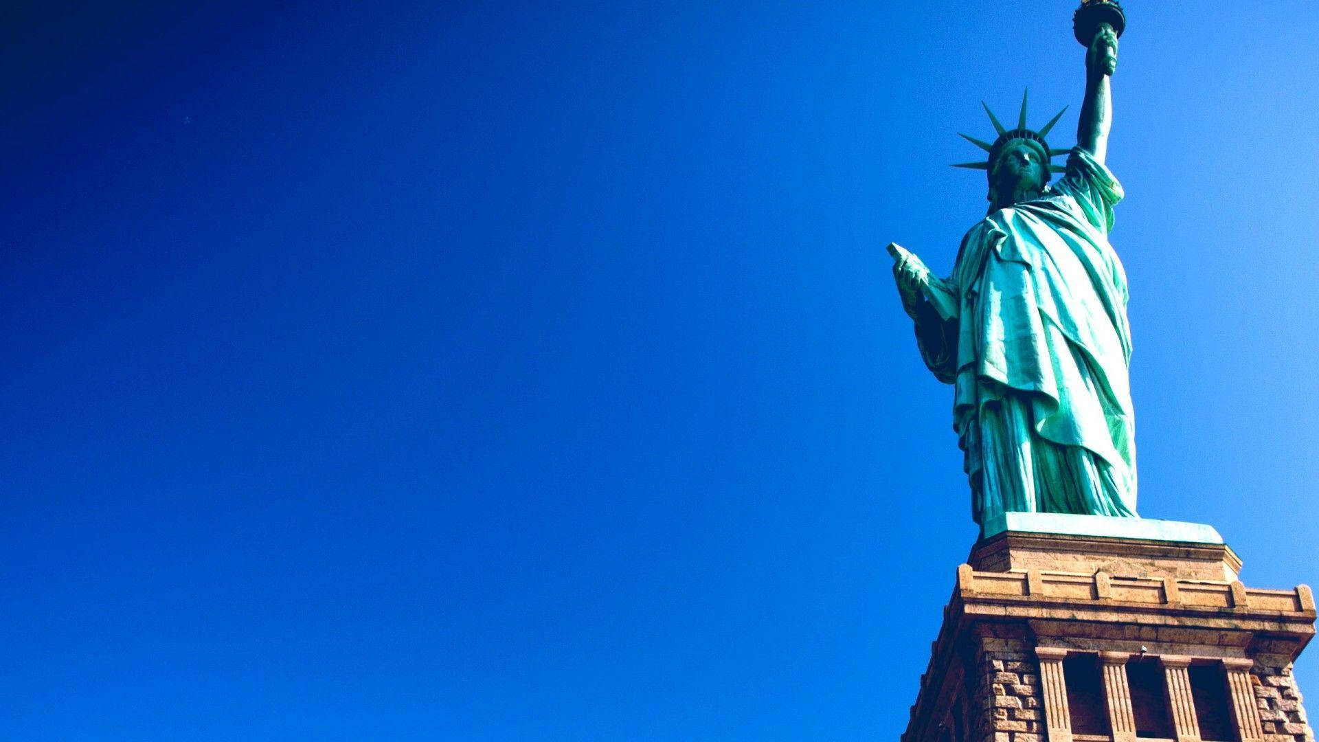 Statue Of Liberty Clear Blue Sky Background