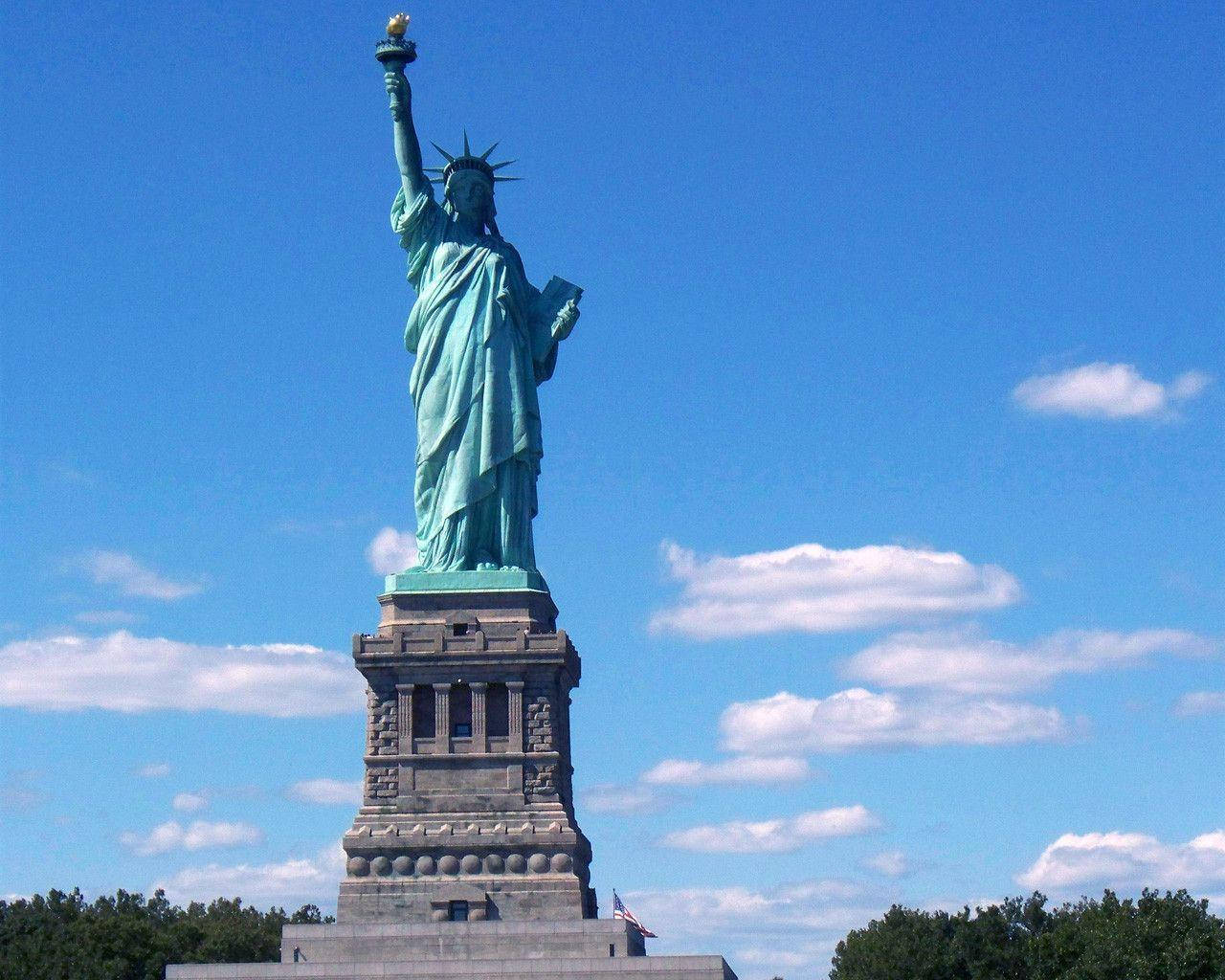 Statue Of Liberty Sunny Day Background