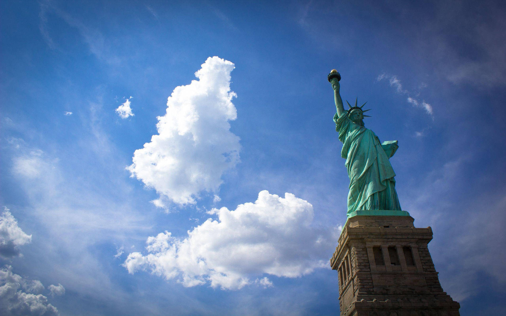 Statue Of Liberty Thick Clouds Background