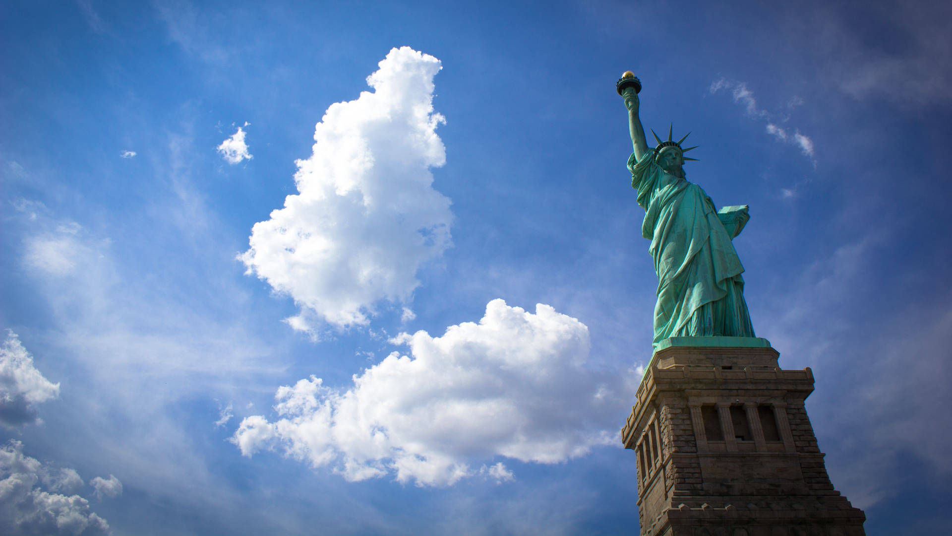 Statue Of Liberty Two Clouds Background