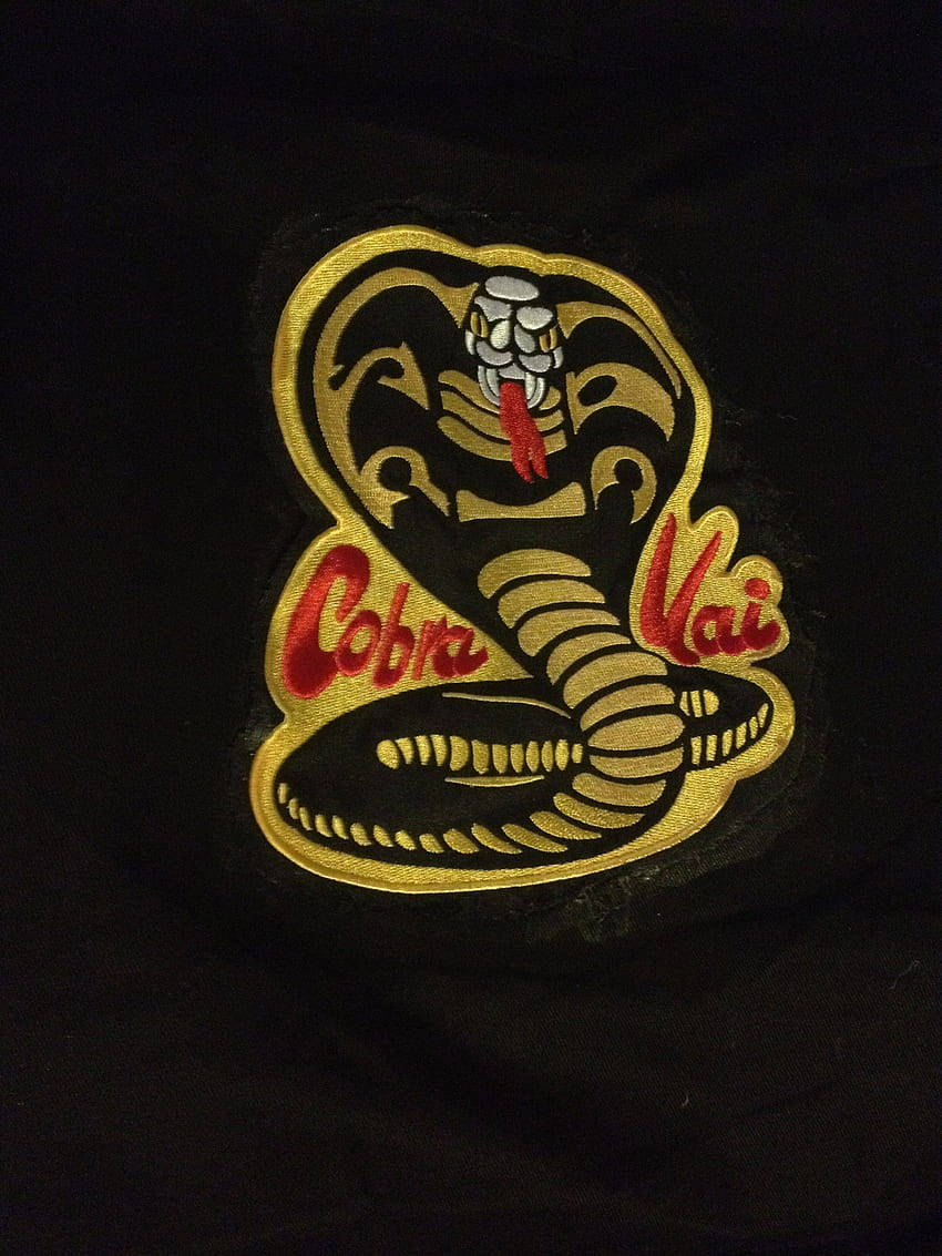 Stay Connected And Ready For A Brawl With The Cobra Kai Phone Background