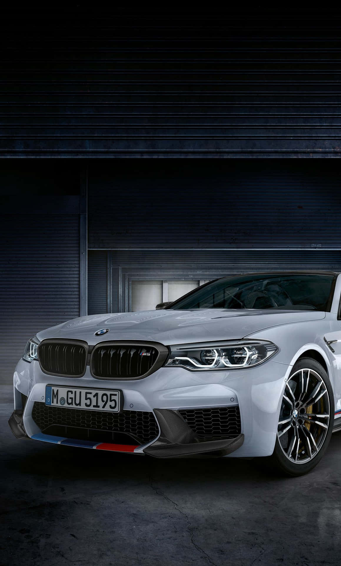 Stay Connected In The Driver's Seat With Your Bmw And An Iphone Background