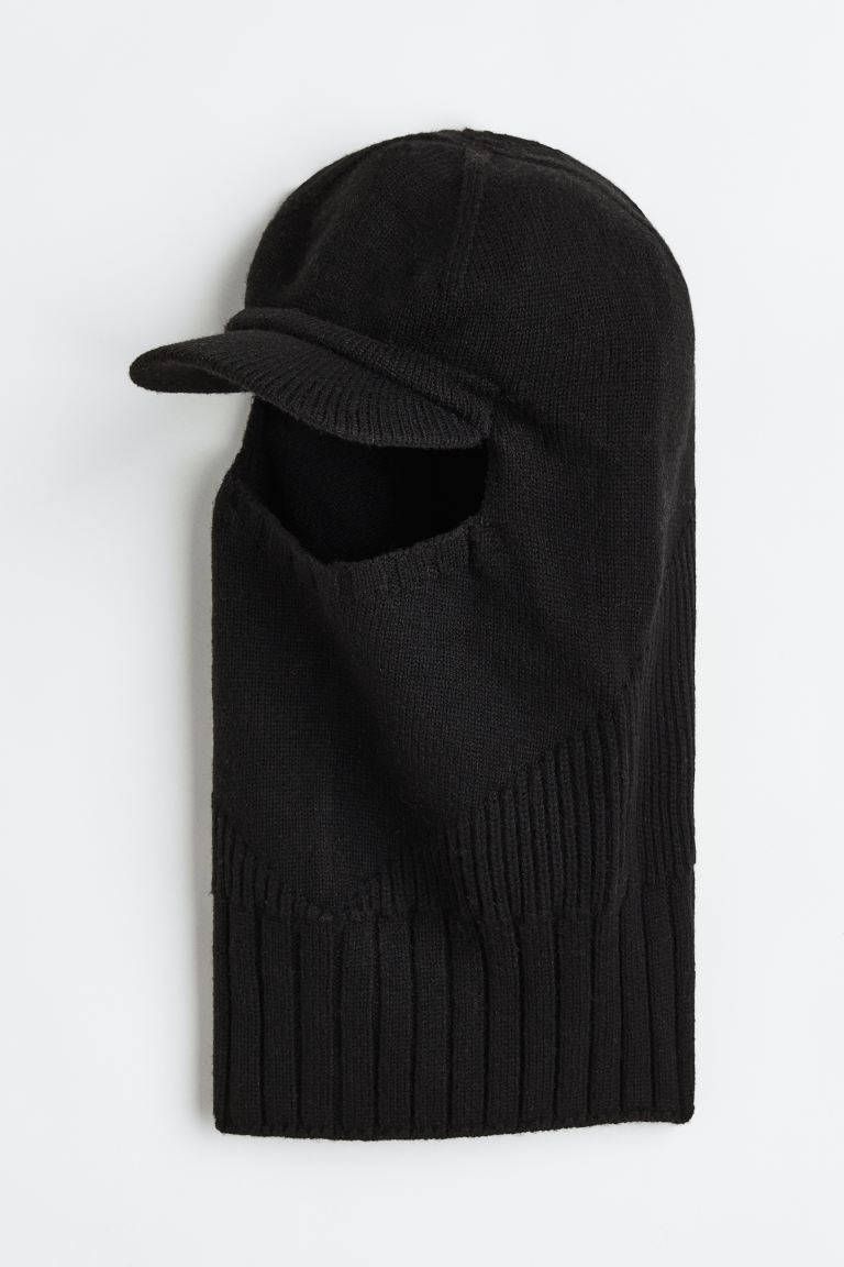 Stay Cozy And Warm This Winter With A Black Ski Mask Background