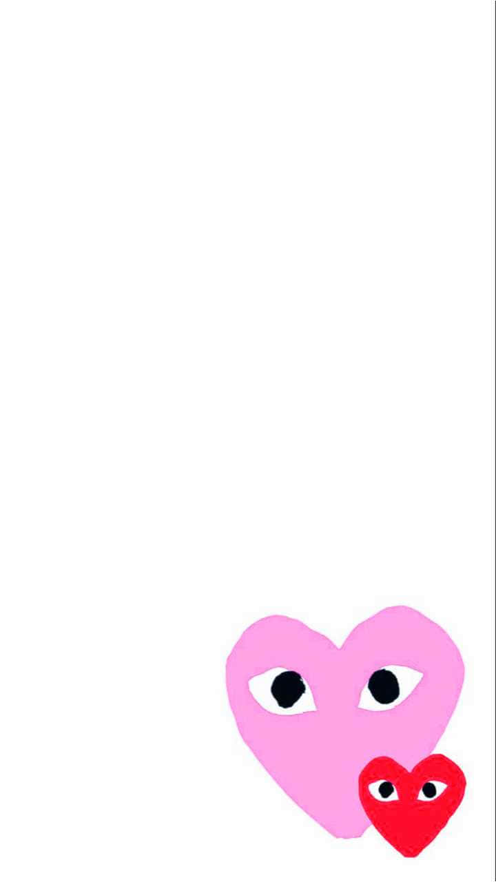 Stay Stylish And Comfortable In The Latest Cdg Play Collection Background