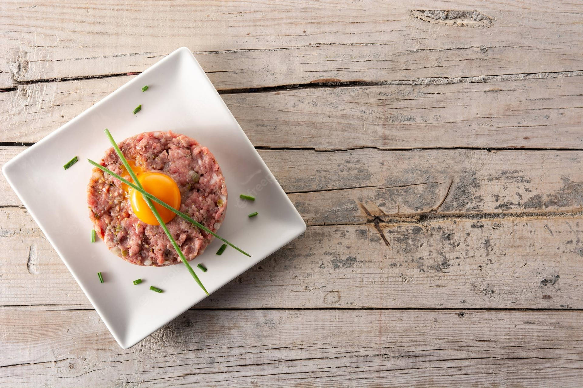 Steak Tartare With Lemon Grass Background