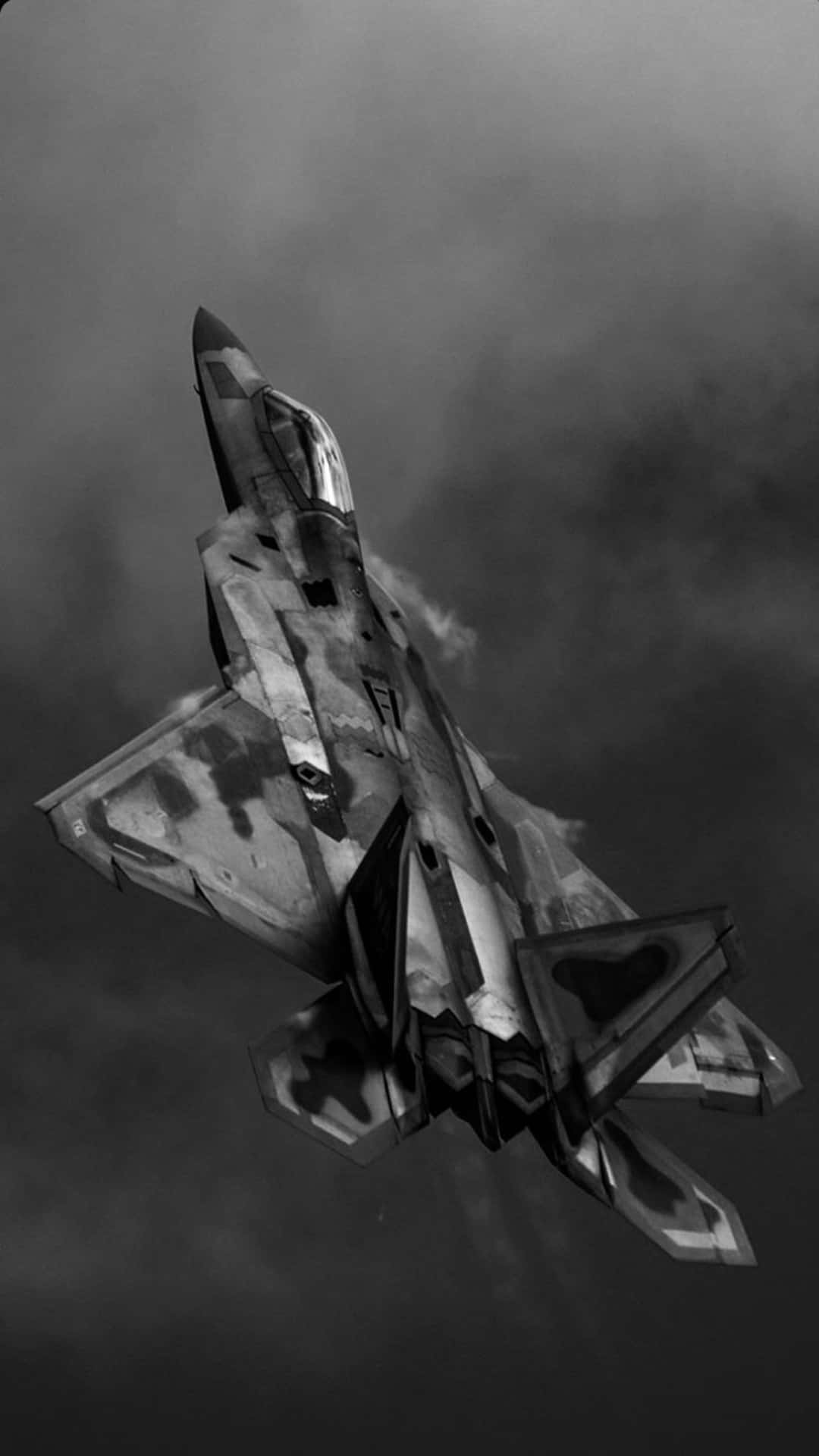 Stealth_ Fighter_ Ascending_ Through_ Clouds Background
