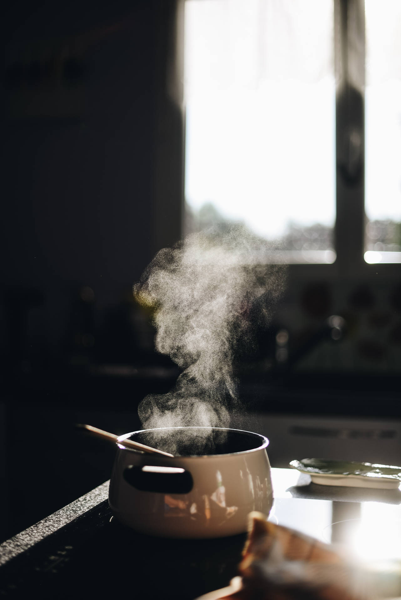 Steam Rises From A Simmering Pot Of Flavorful Concoction. Background