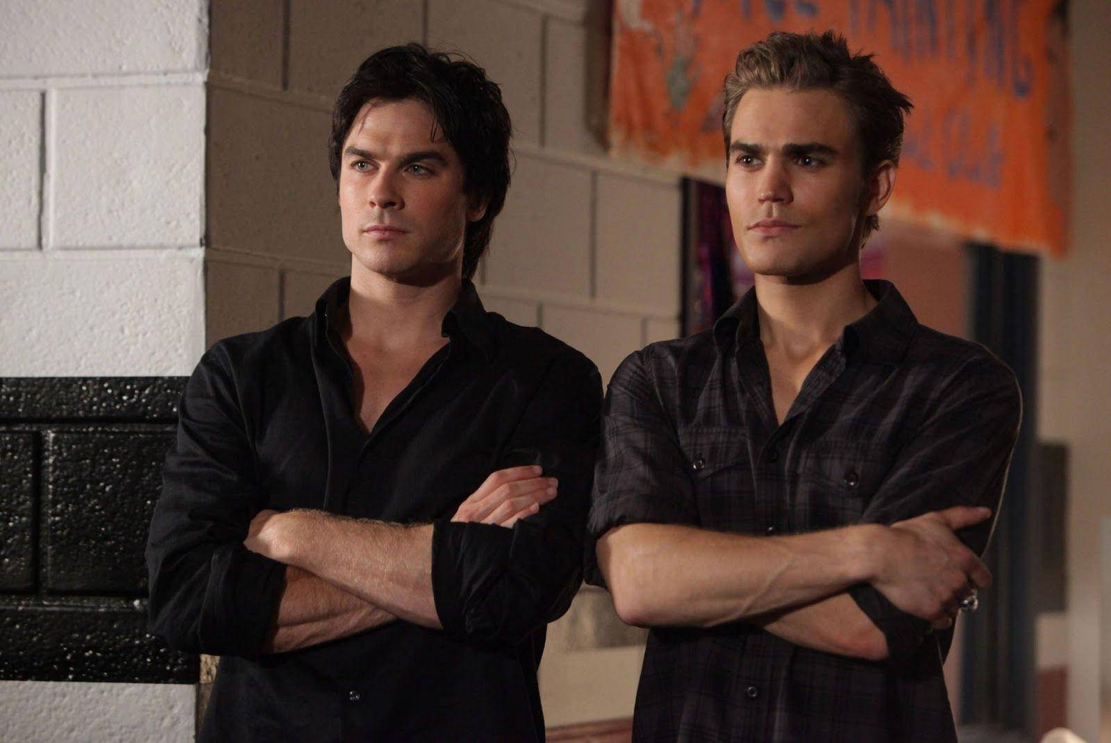 Stefan And Damon Salvatore Crossed Arms Background
