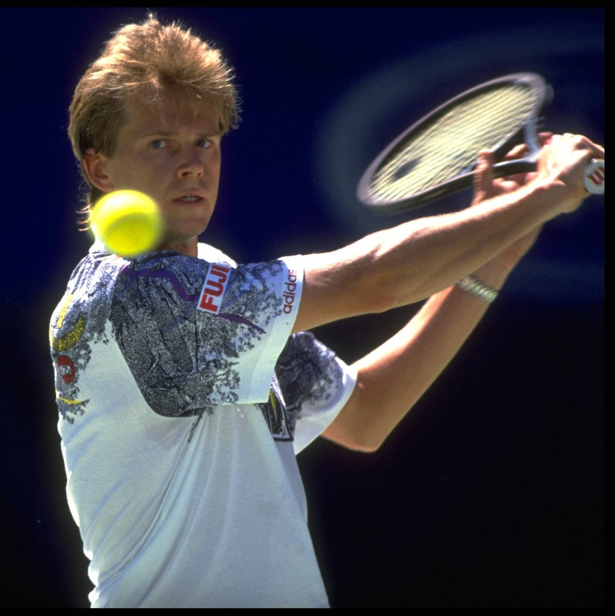 Stefan Edberg Smashing Tennis Ball Background