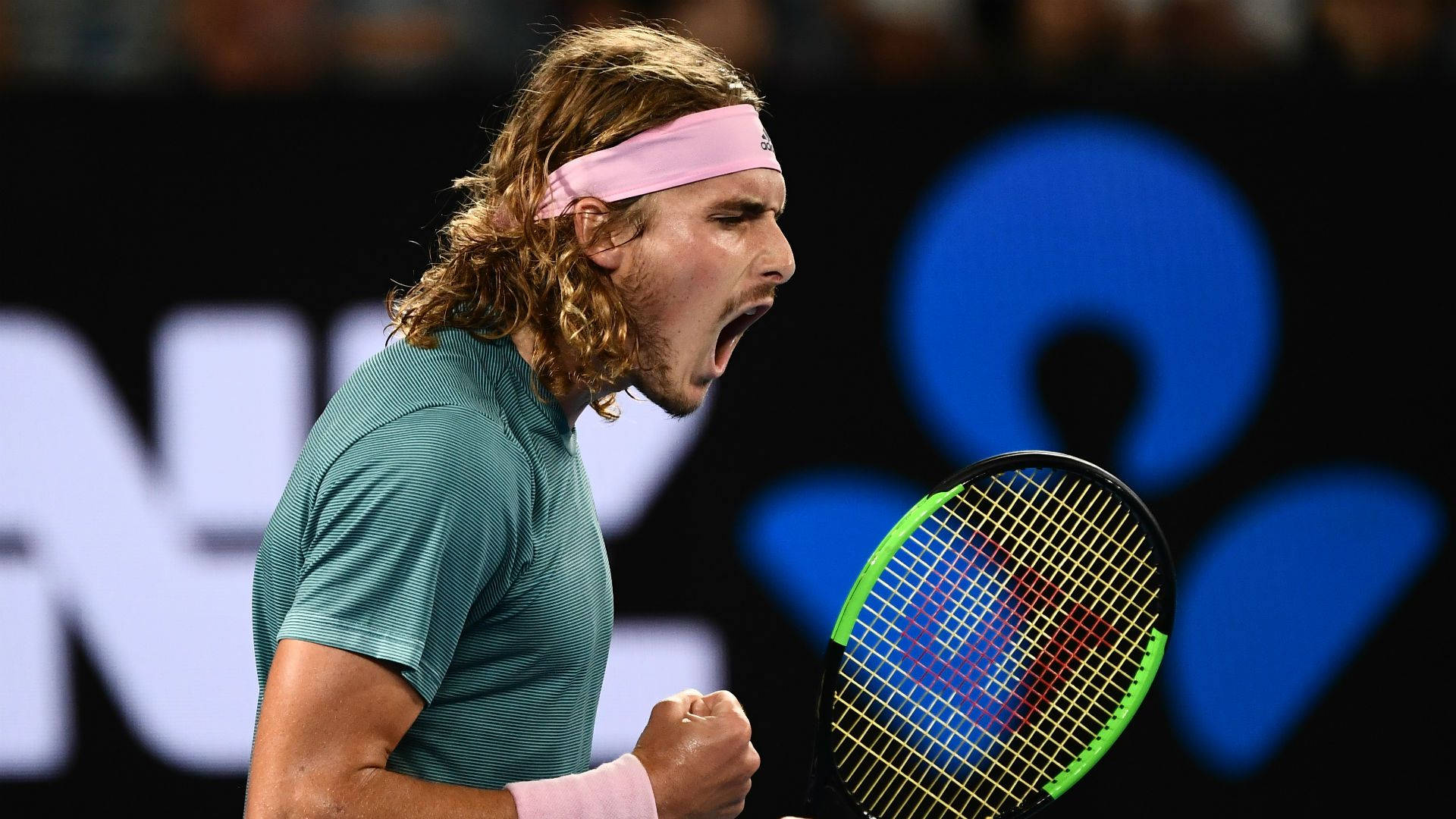 Stefanos Tsitsipas Basking In Victory Background