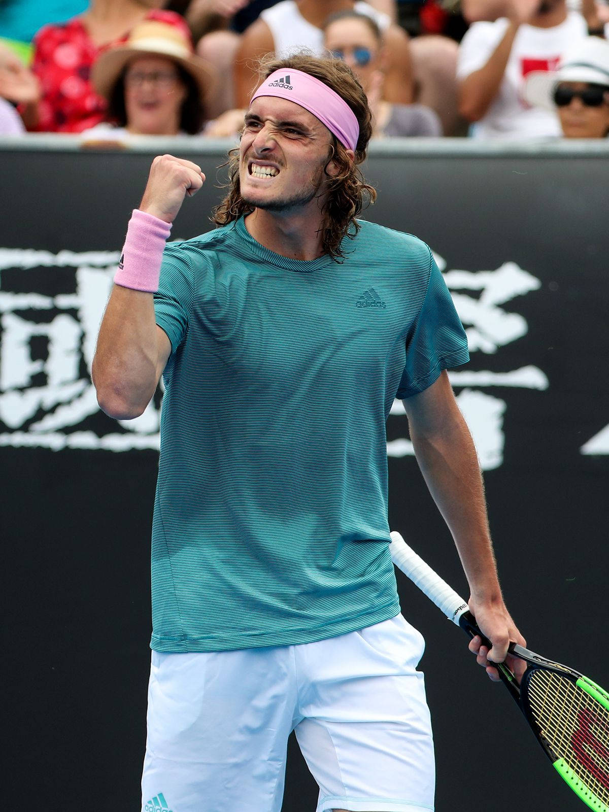 Stefanos Tsitsipas Gritted Teeth Background