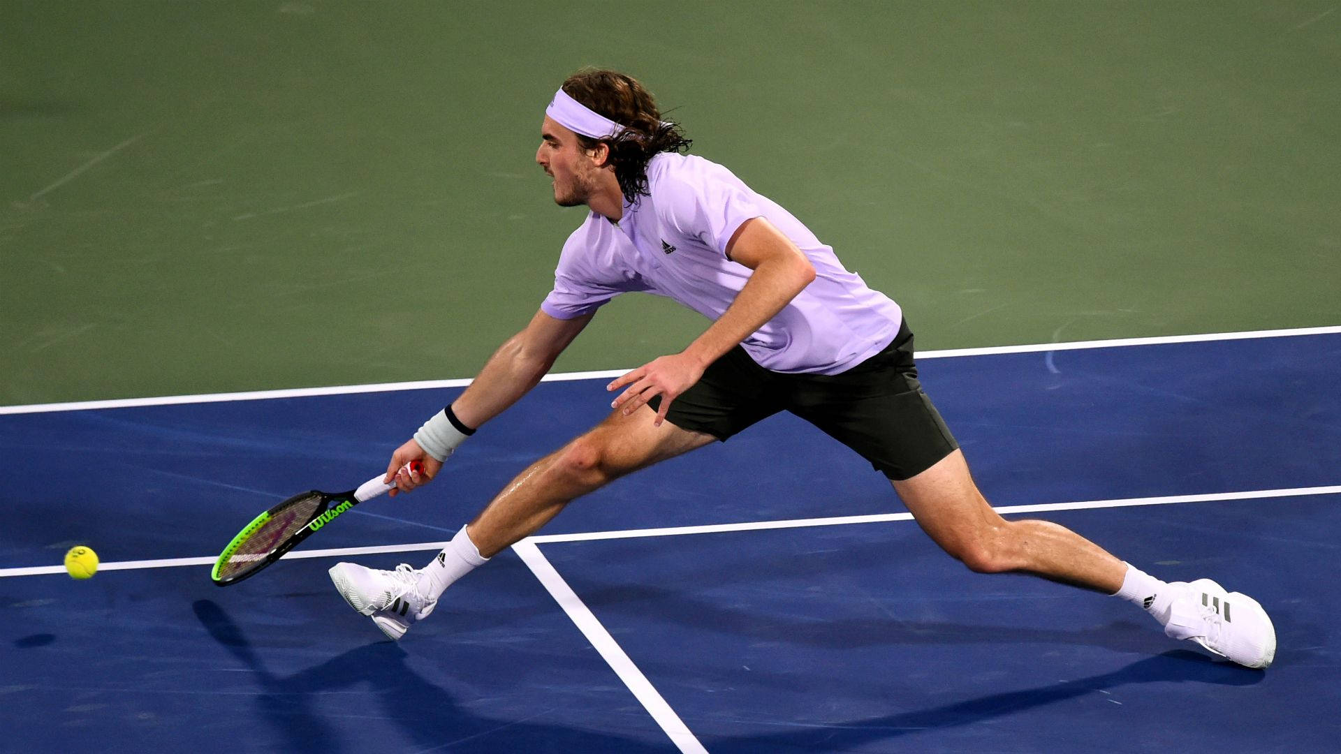 Stefanos Tsitsipas Huge Stride Background