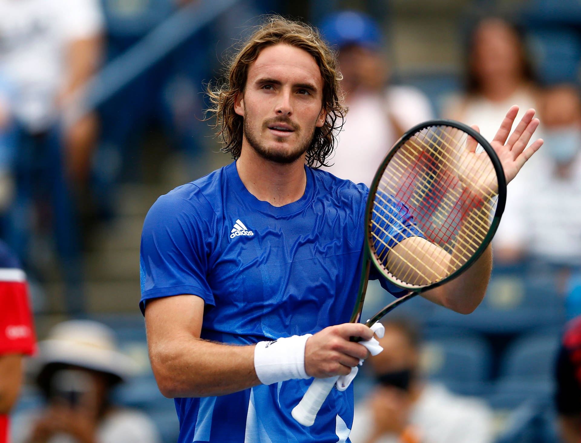 Stefanos Tsitsipas Palming His Racket