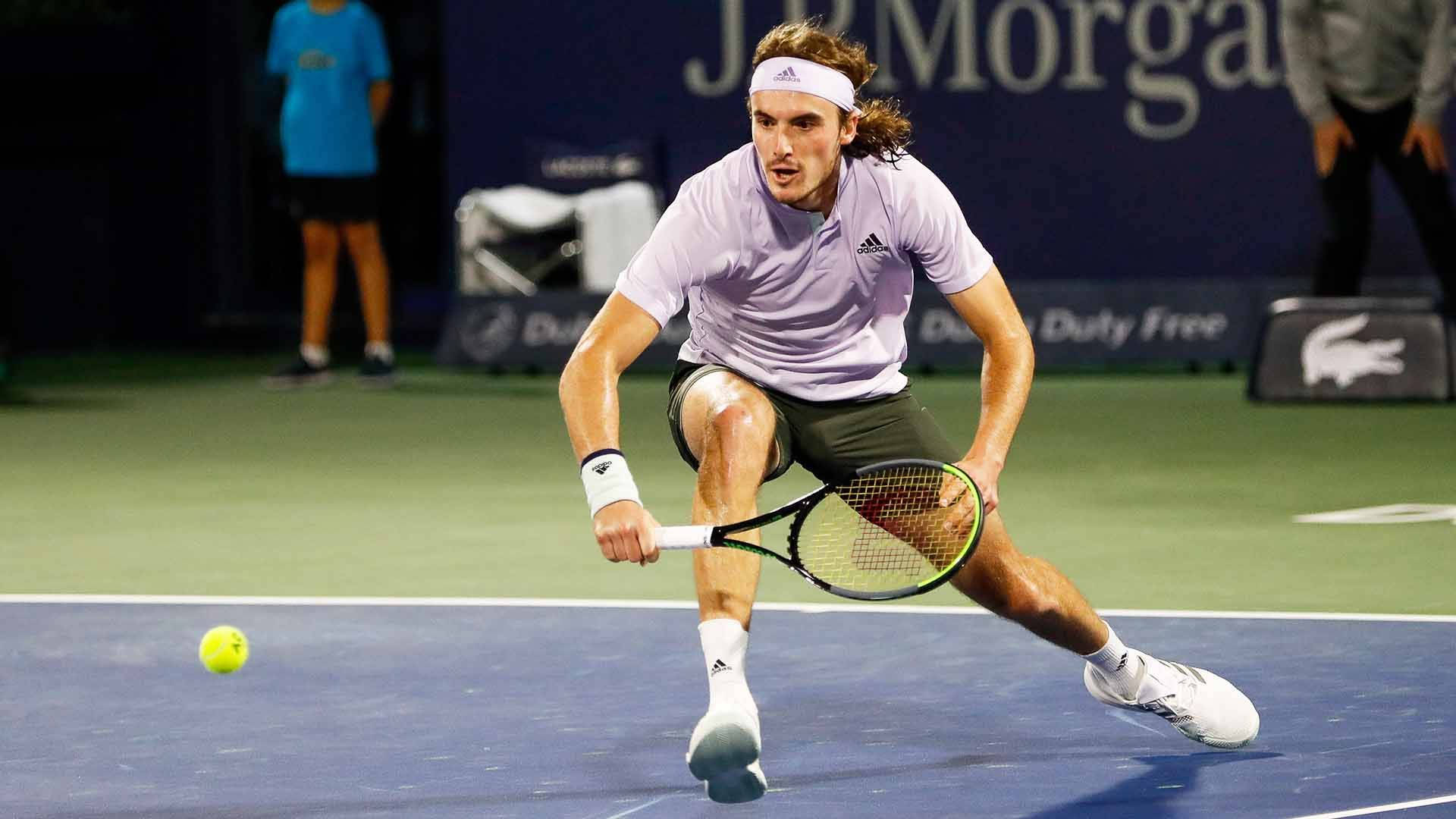 Stefanos Tsitsipas Poised In Action.