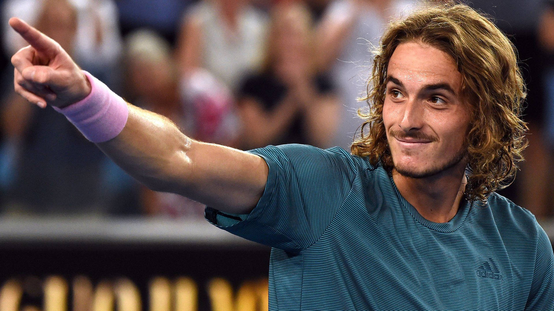 Stefanos Tsitsipas Smiling At Crowd Background