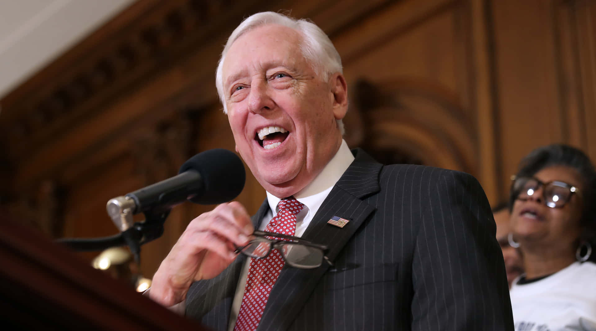Steny Hoyer Holding His Glasses Thoughtfully Background