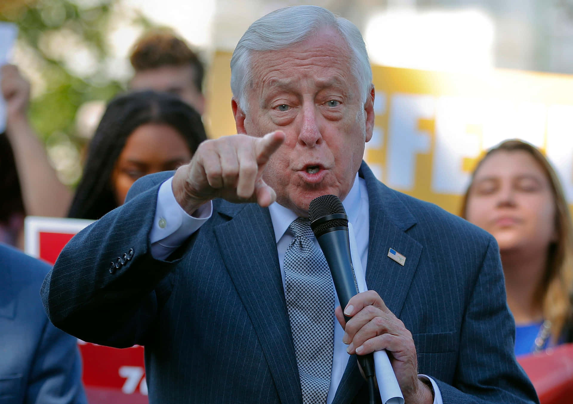 Steny Hoyer Pointing Intently At A Political Event Background