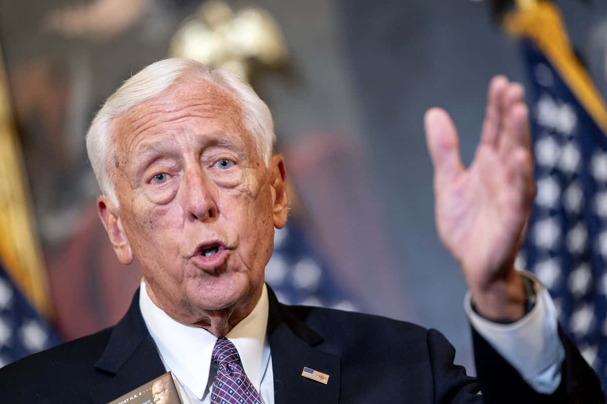 Steny Hoyer Raising Hand While Talking Background