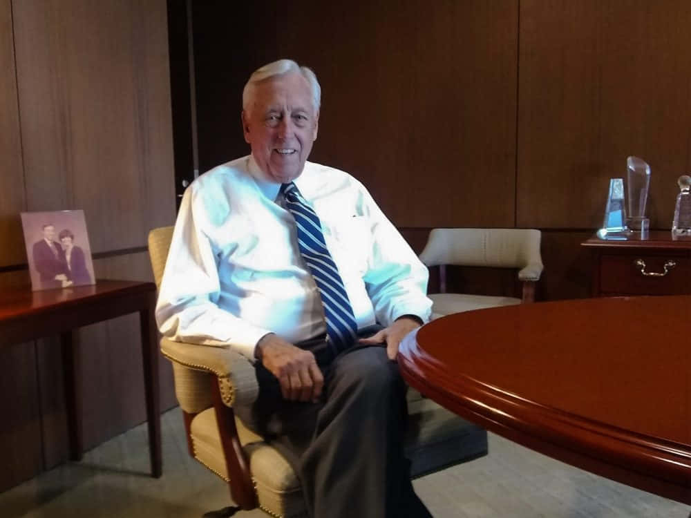 Steny Hoyer Sitting Down And Smiling Background