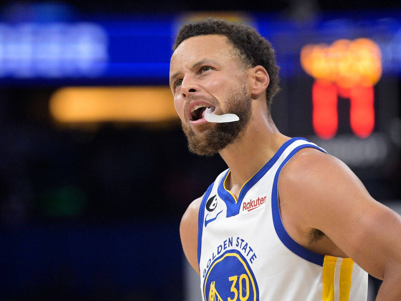 Steph Curry Chewing His Mouthpiece Background