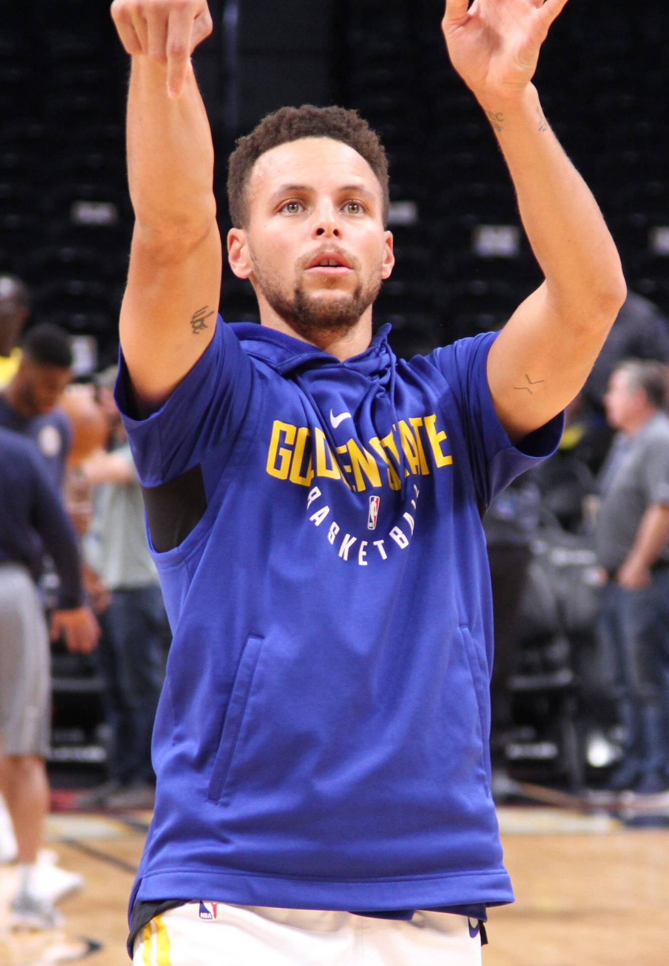 Steph Curry Shooting While Wearing Hoodie Background