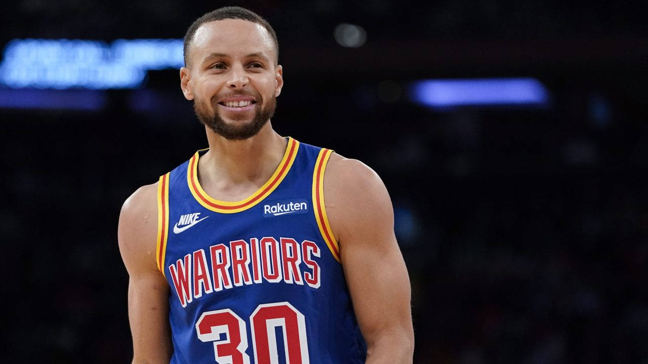 Steph Curry Smiling With Teeth Exposed Background