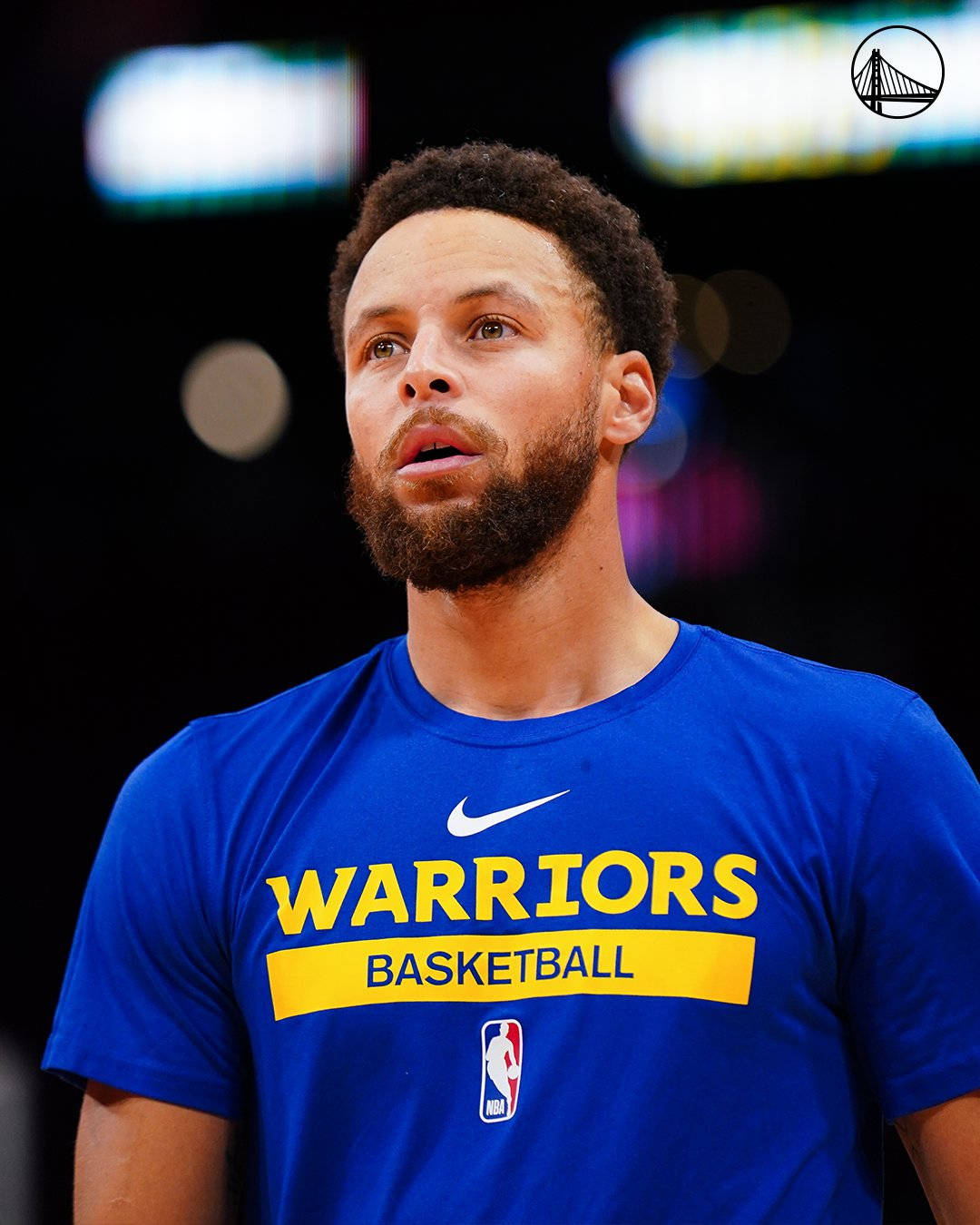 Steph Curry Wearing Blue Warriors T-shirt Background