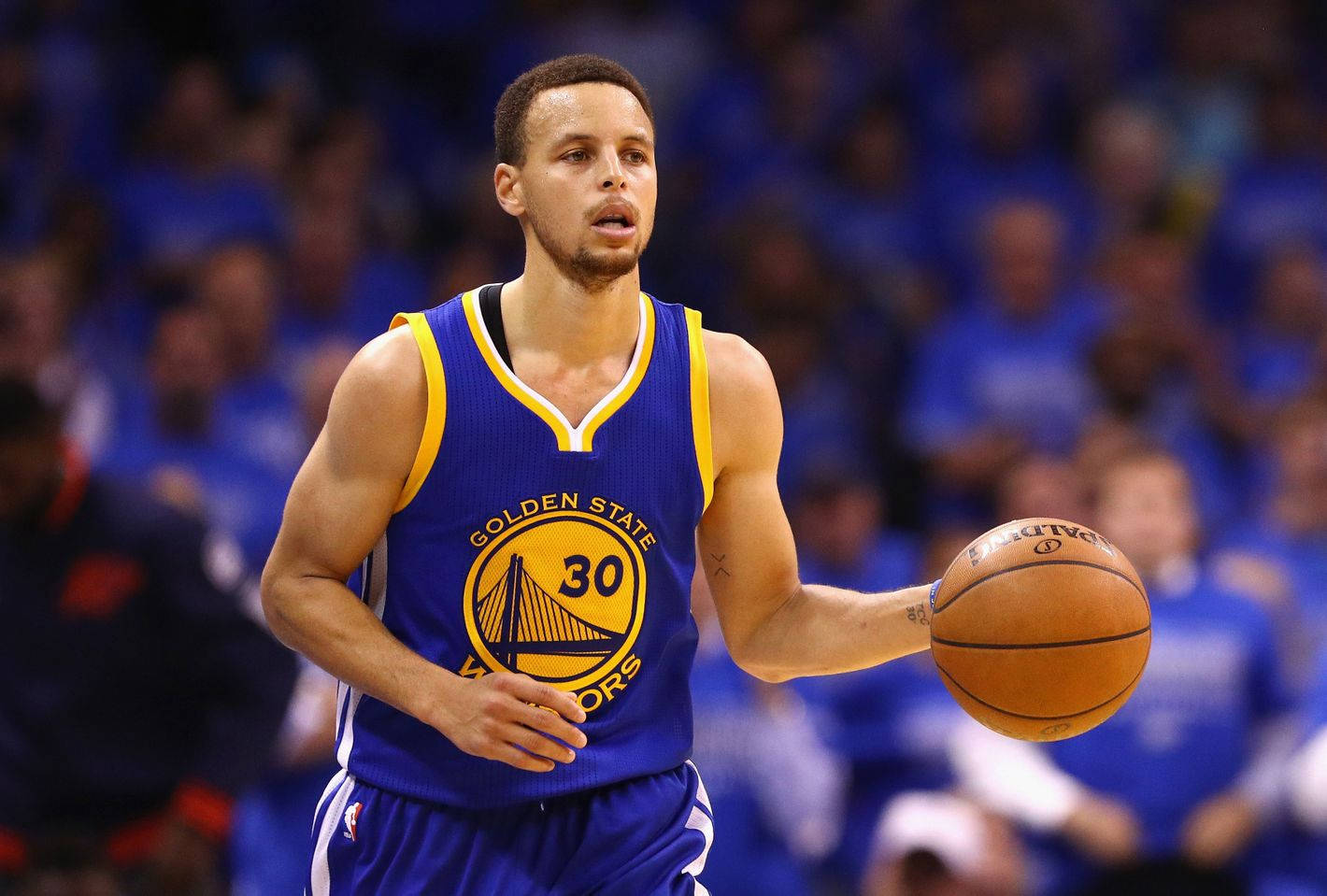 Steph Curry With Ball On Hand Background