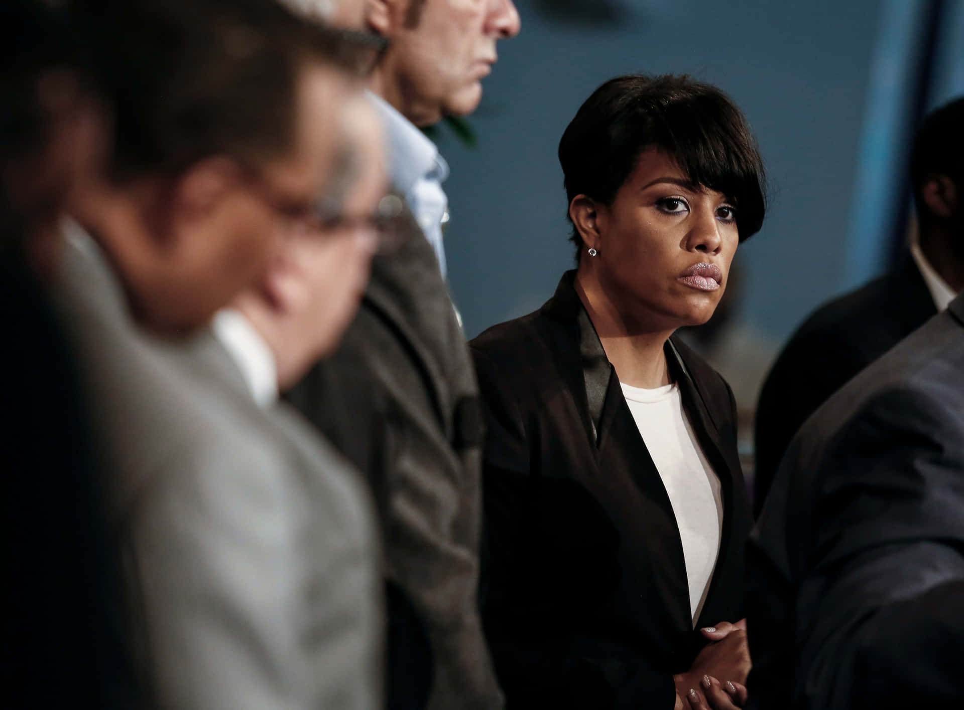 Stephanie Rawlings Blake Surrounded By Men Background
