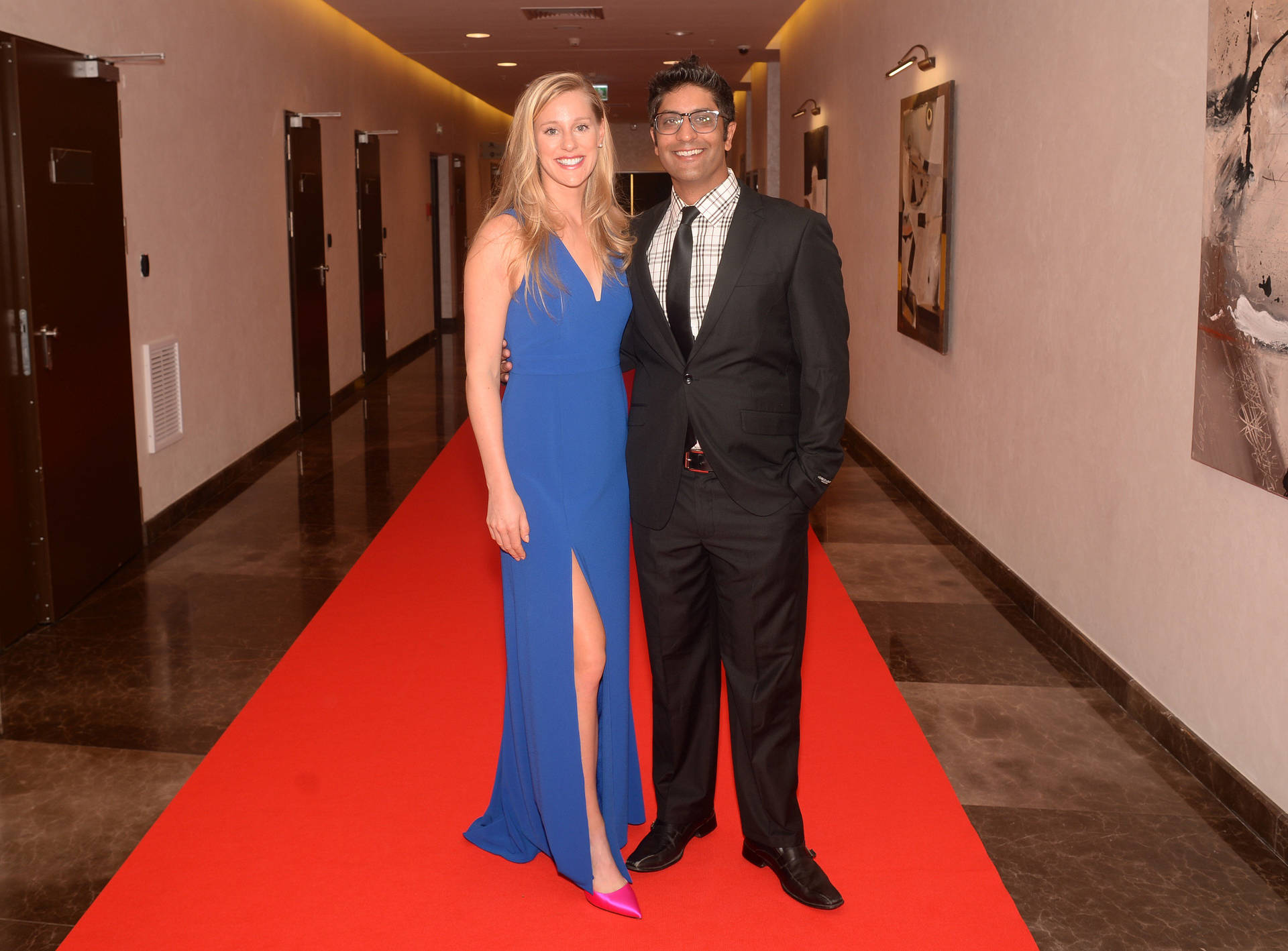 Stephen Amritraj And Alison Riske-amritraj Posing On The Red Carpet