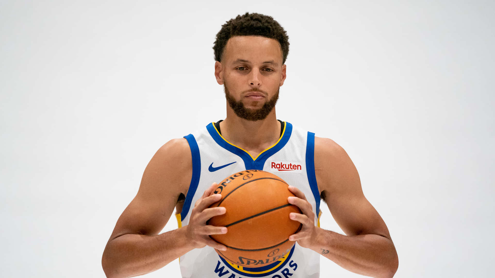 Stephen Curry 4k Holding Basketball With Both Hands Background