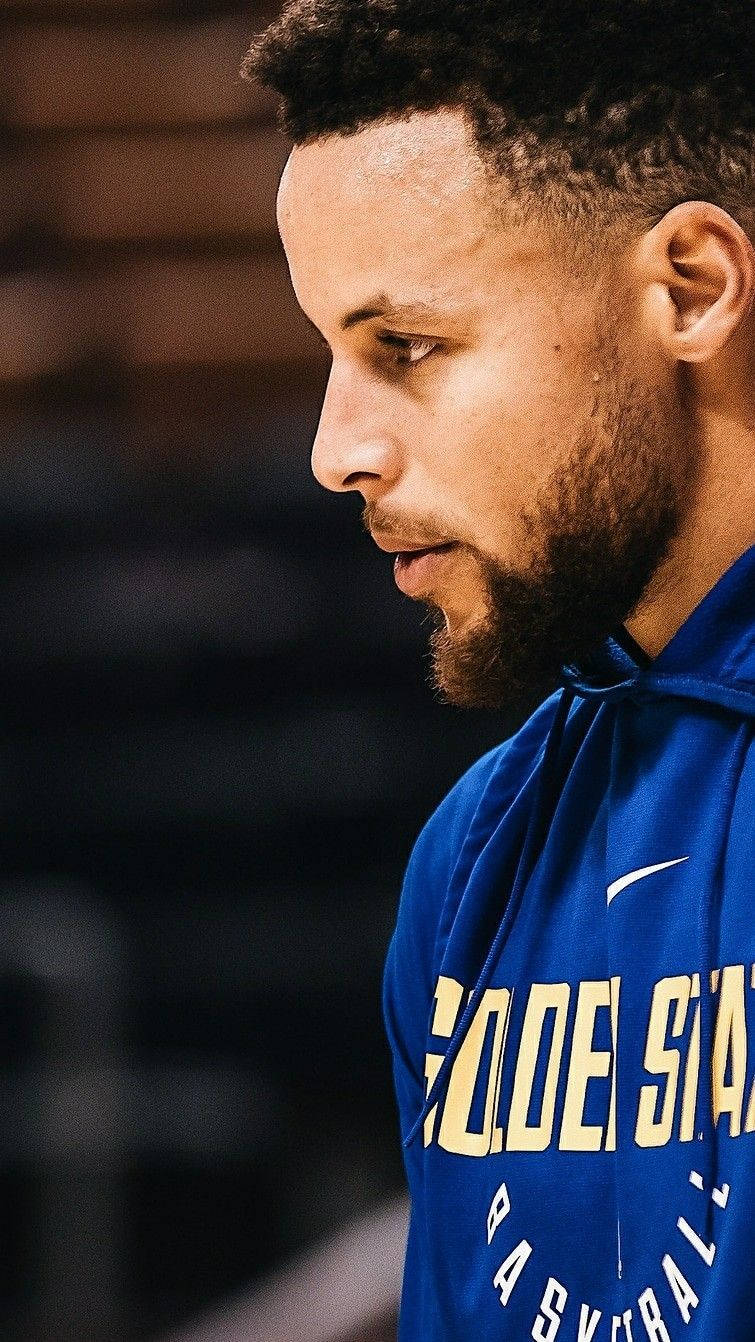 Stephen Curry In Blue Jacket Background